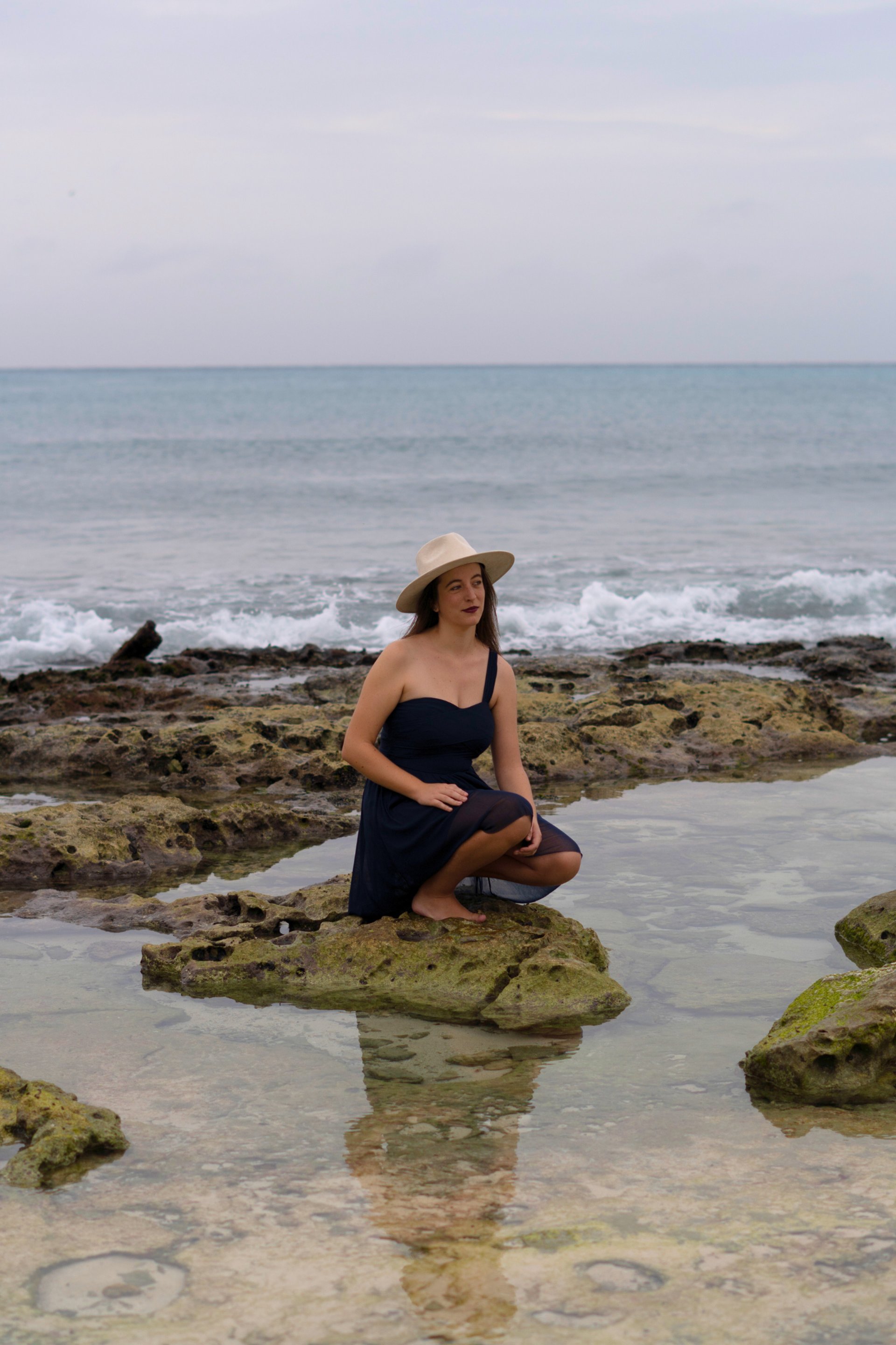 black and brown leather padded tub sofa