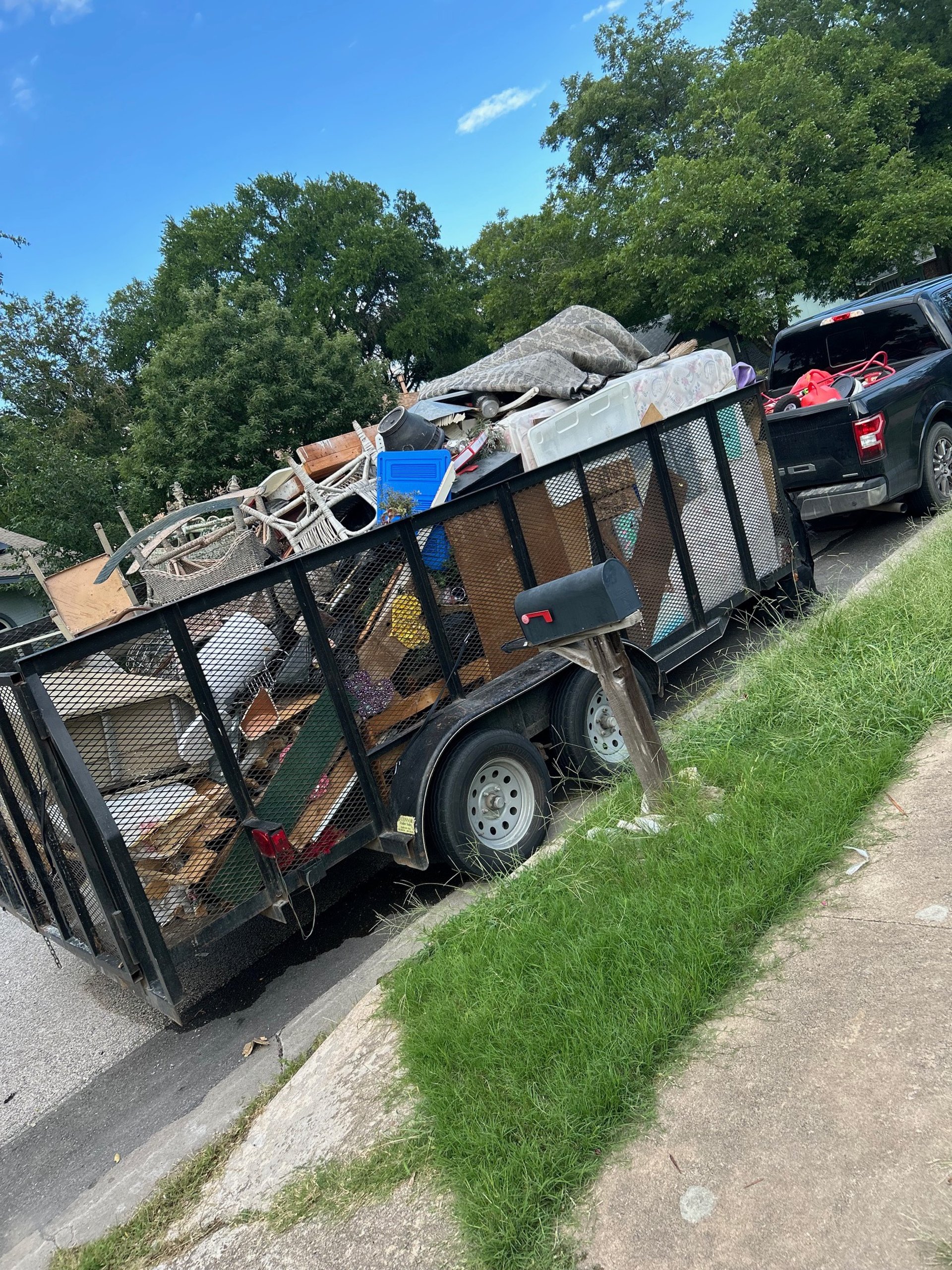 black and brown leather padded tub sofa