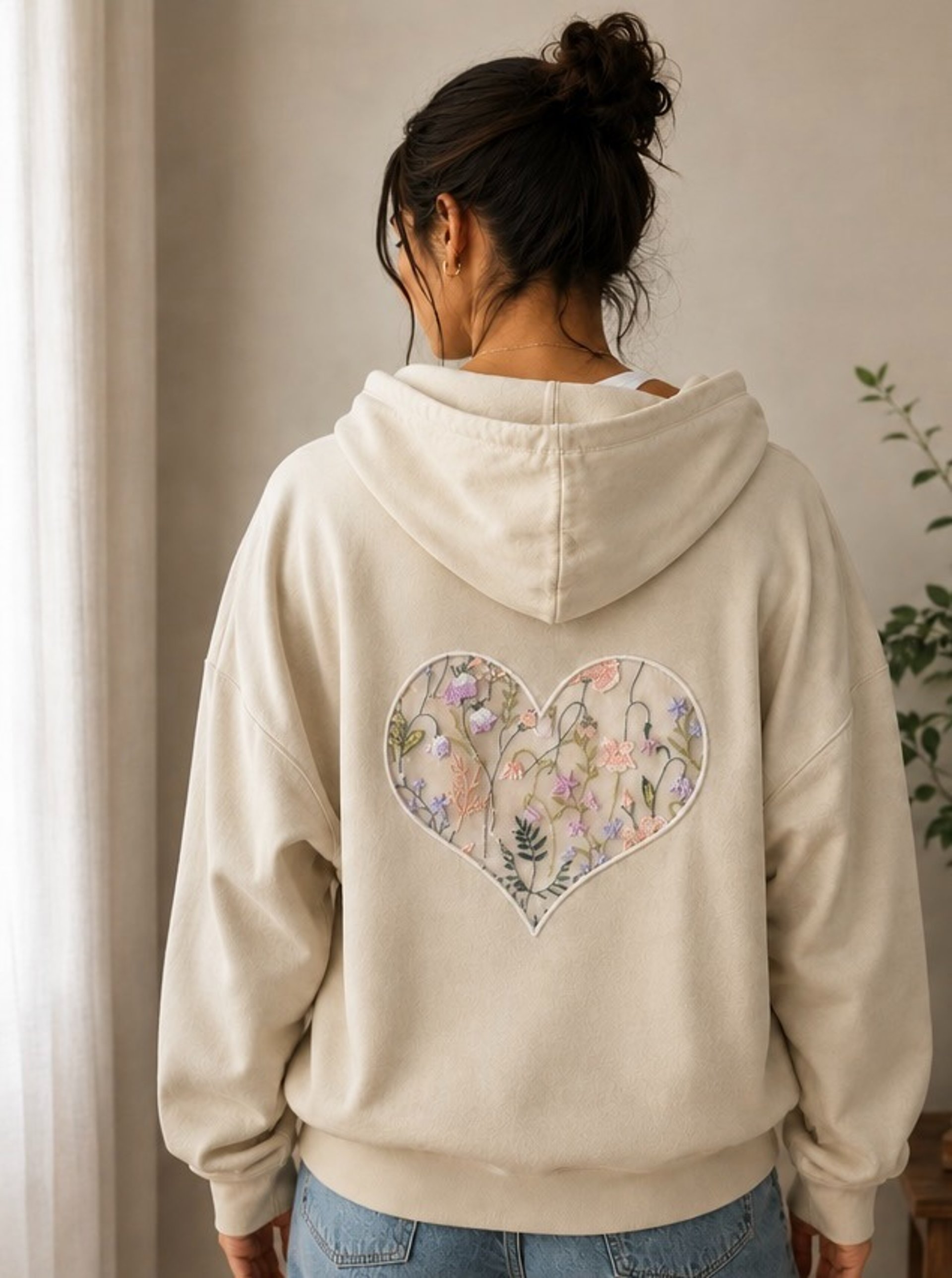 person wearing grey knit sweater