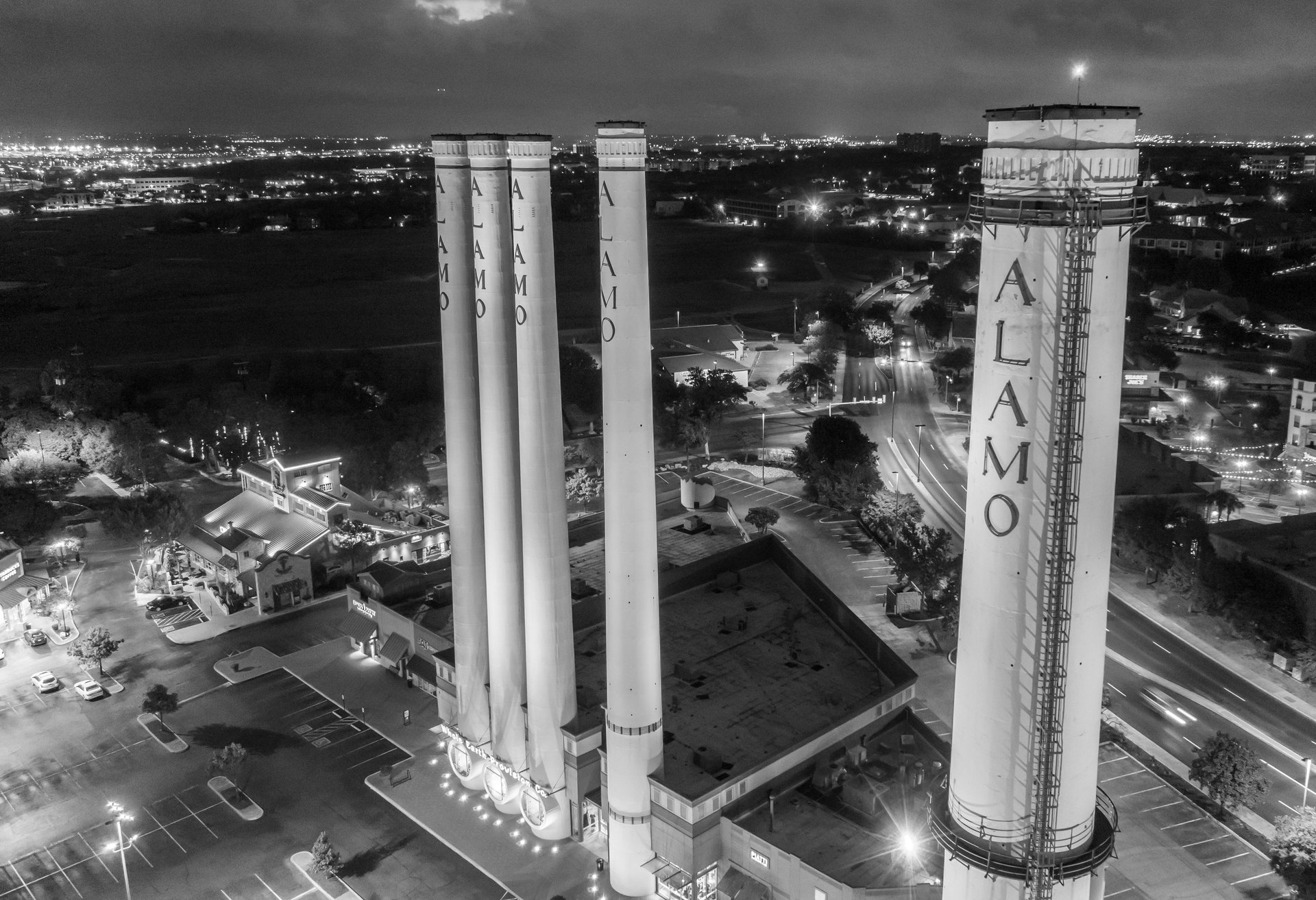 black nikon dslr camera on white printer paper