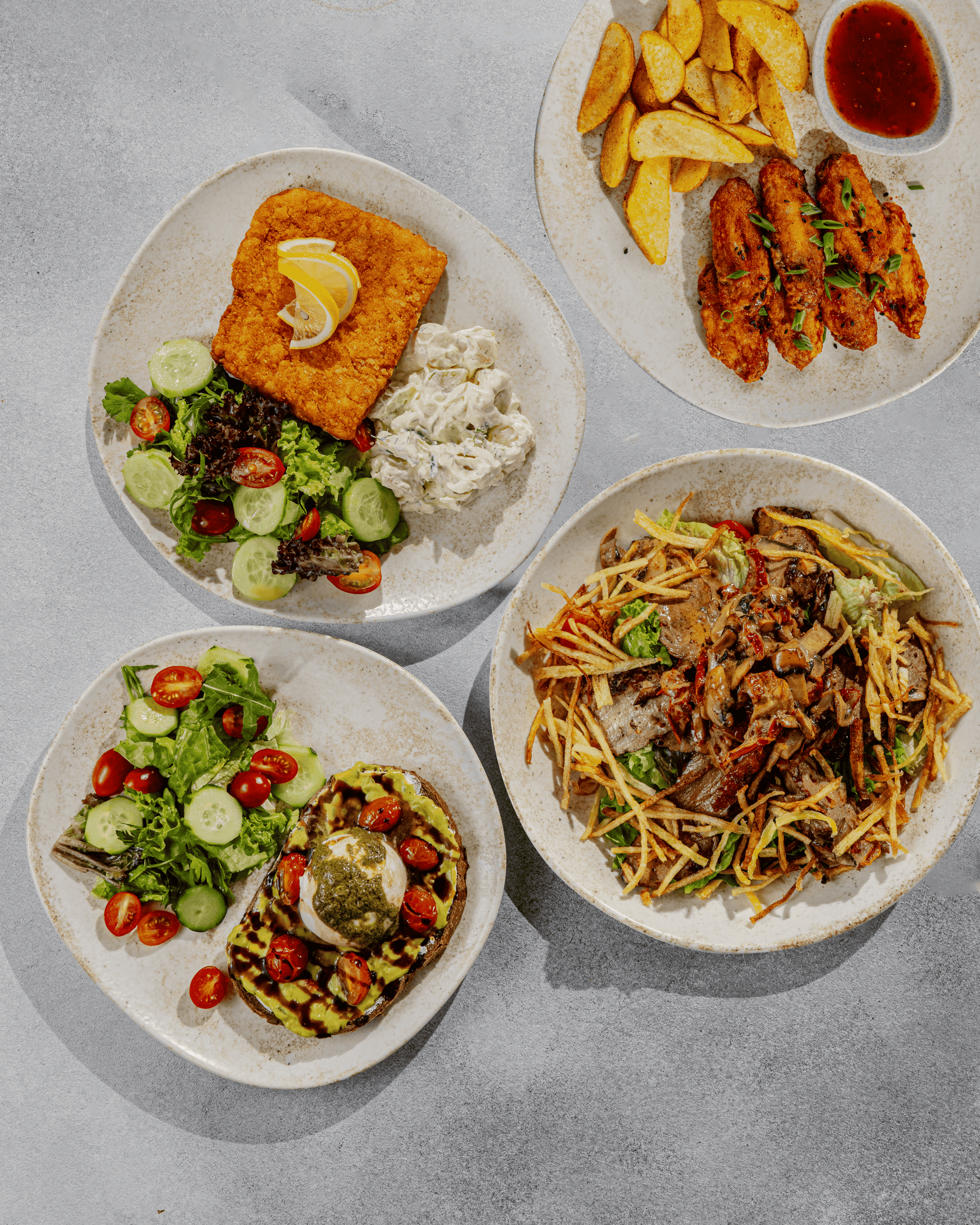 an abstract photo of a curved building with a blue sky in the background