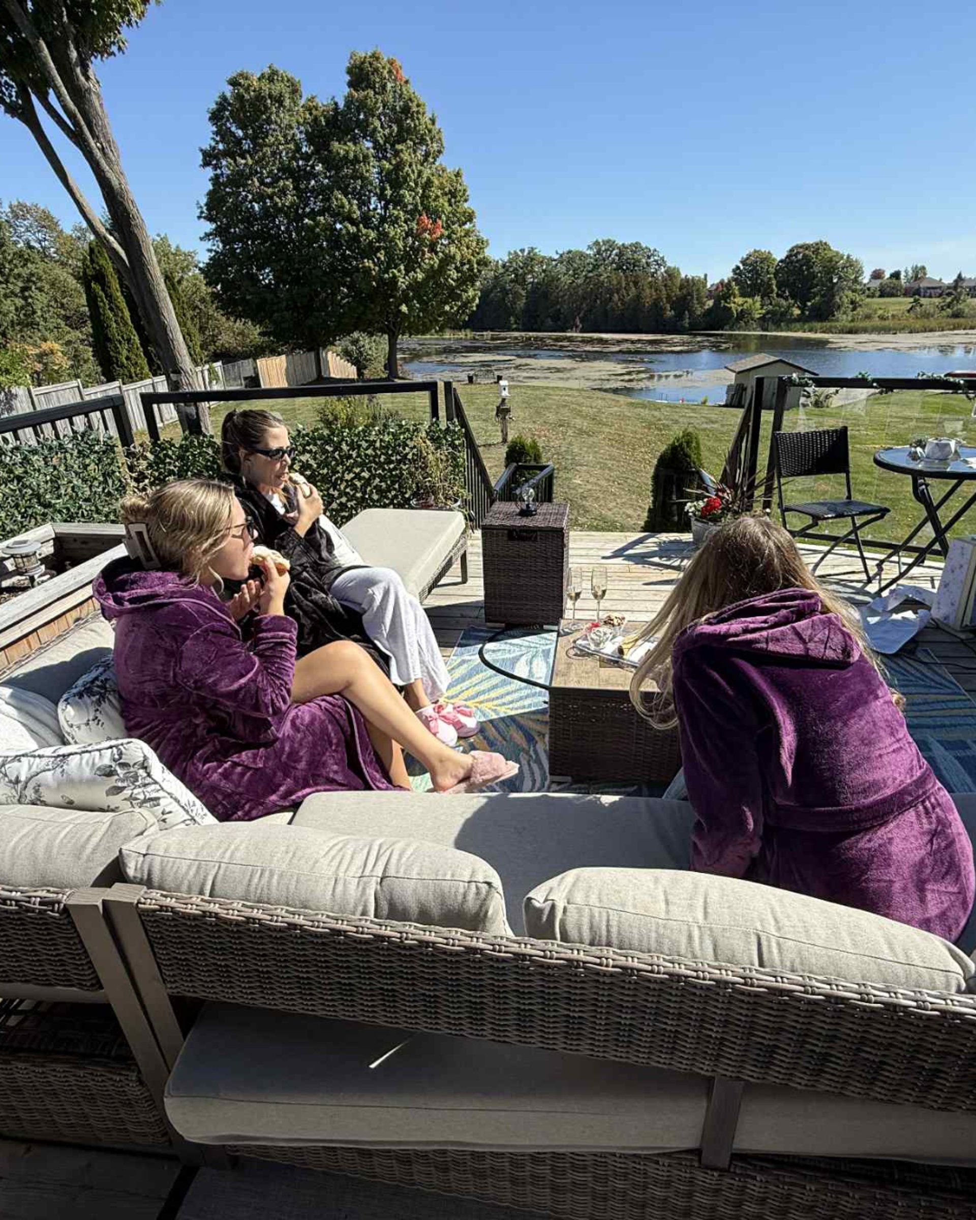 an abstract photo of a curved building with a blue sky in the background
