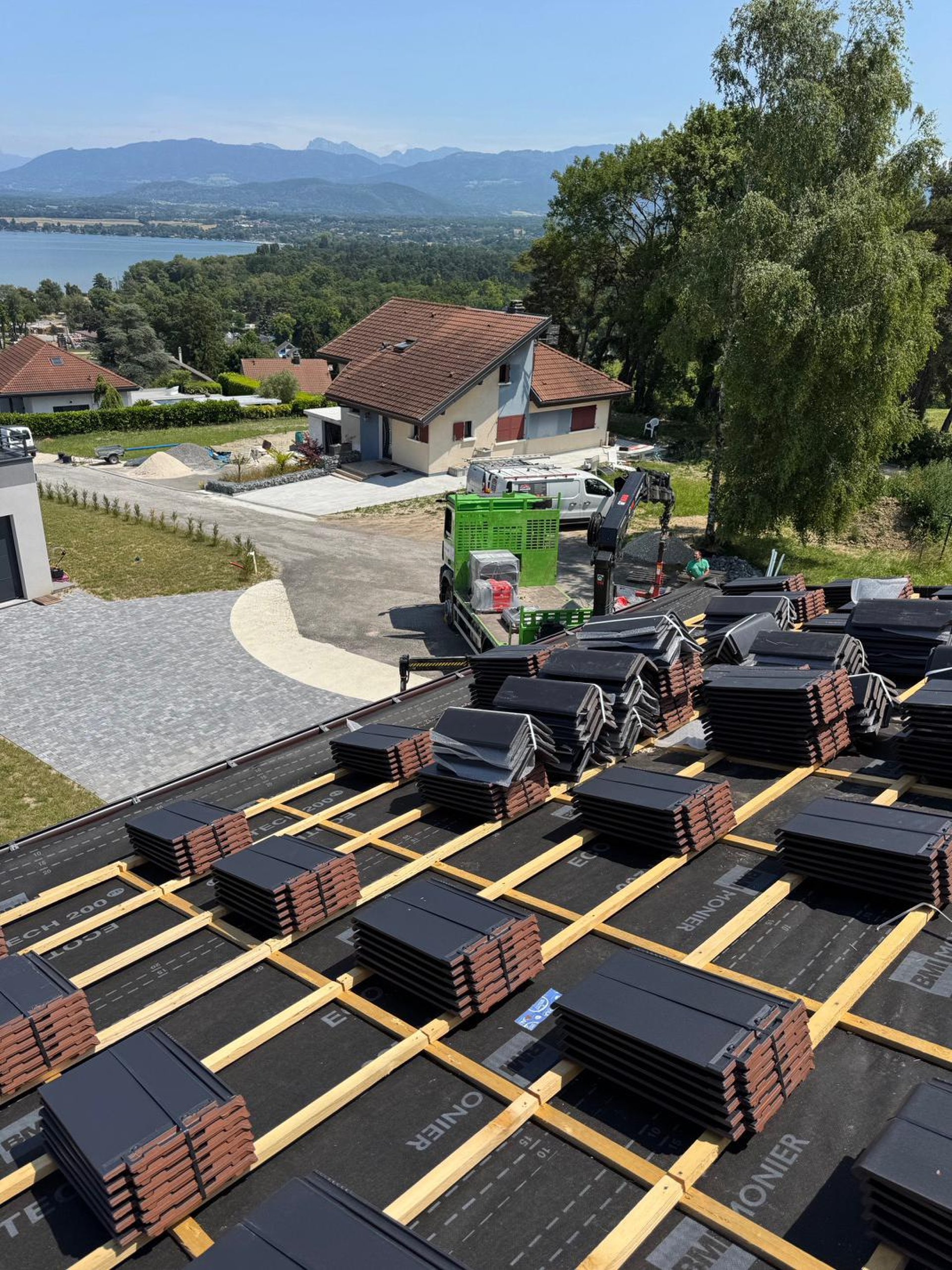 a person wearing blue gloves and holding a hammer