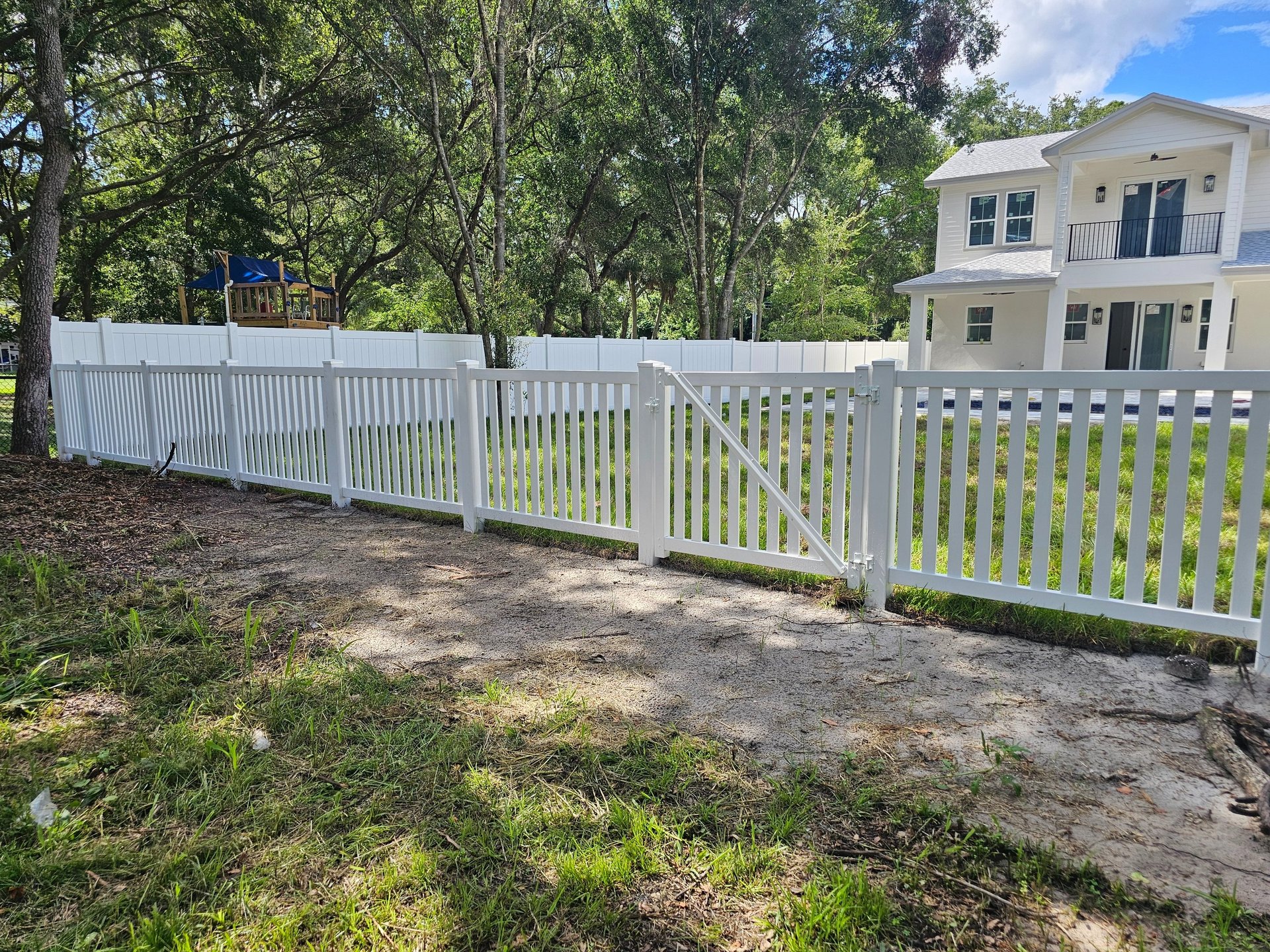 an abstract photo of a curved building with a blue sky in the background