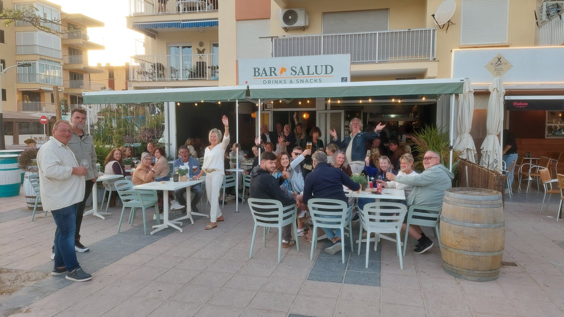woman wearing yellow long-sleeved dress under white clouds and blue sky during daytime