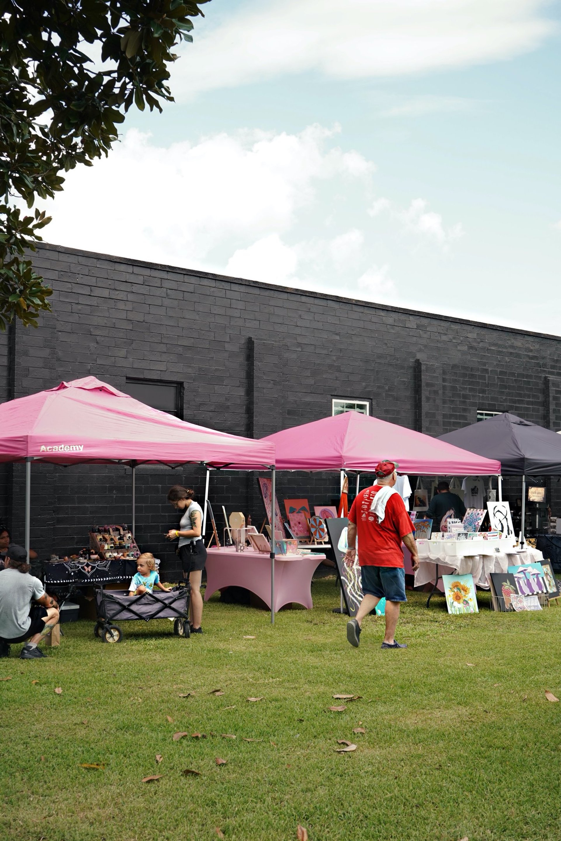an abstract photo of a curved building with a blue sky in the background