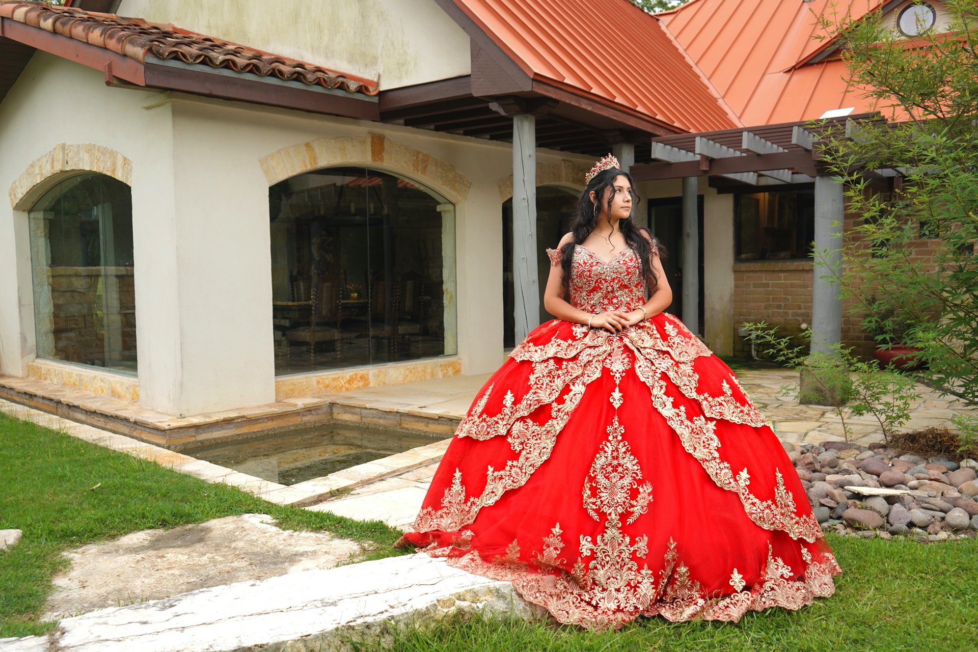 an abstract photo of a curved building with a blue sky in the background