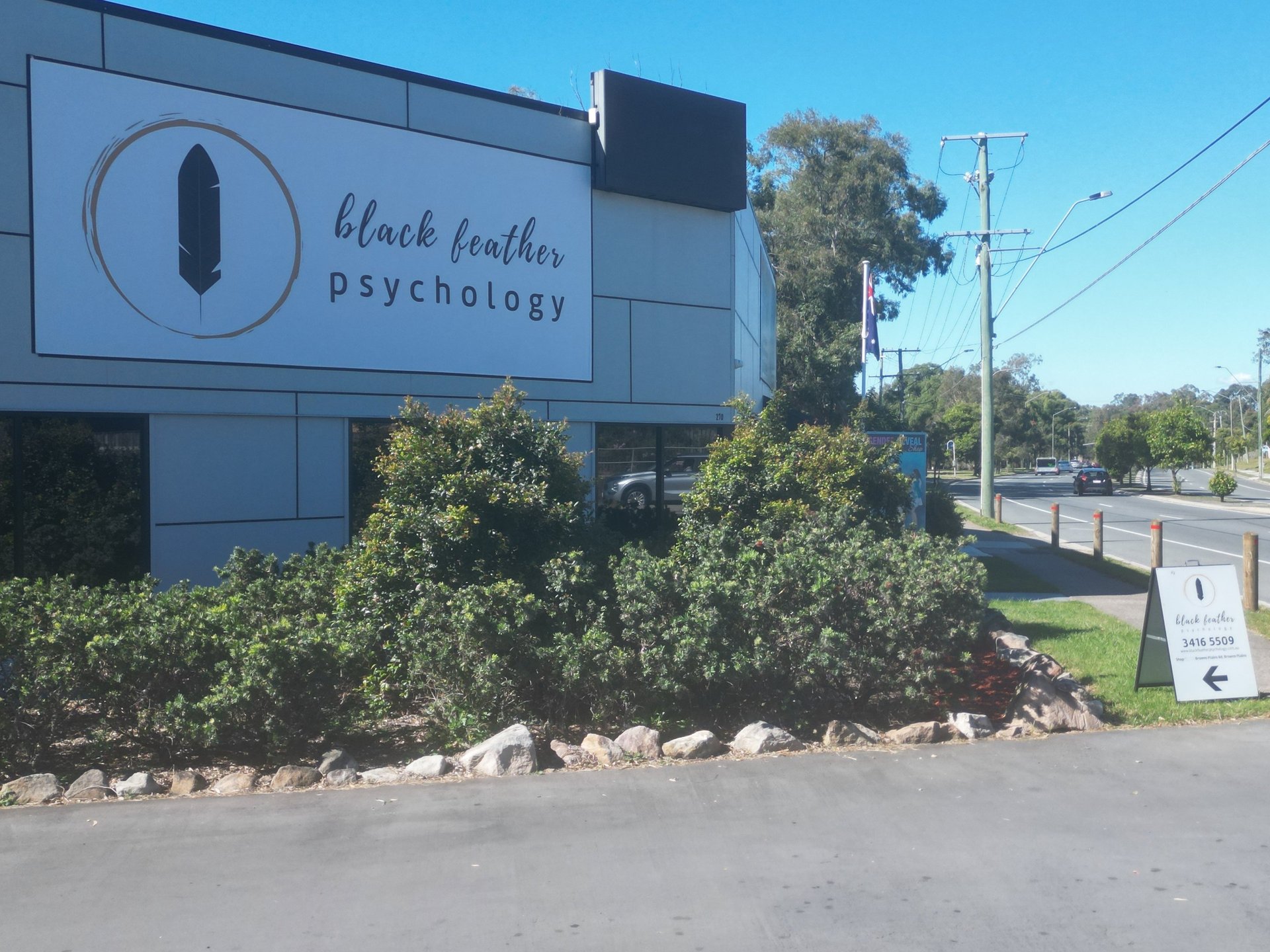 black and brown leather padded tub sofa