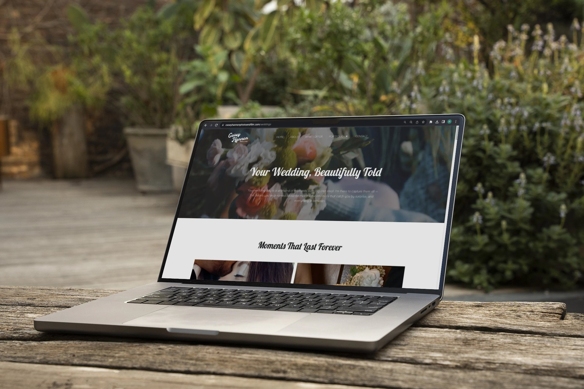 silver macbook on white table