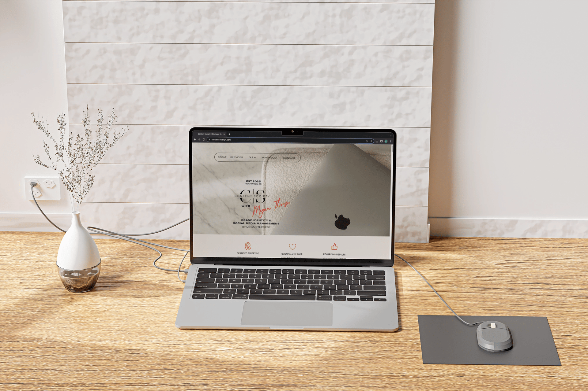 silver macbook on white table