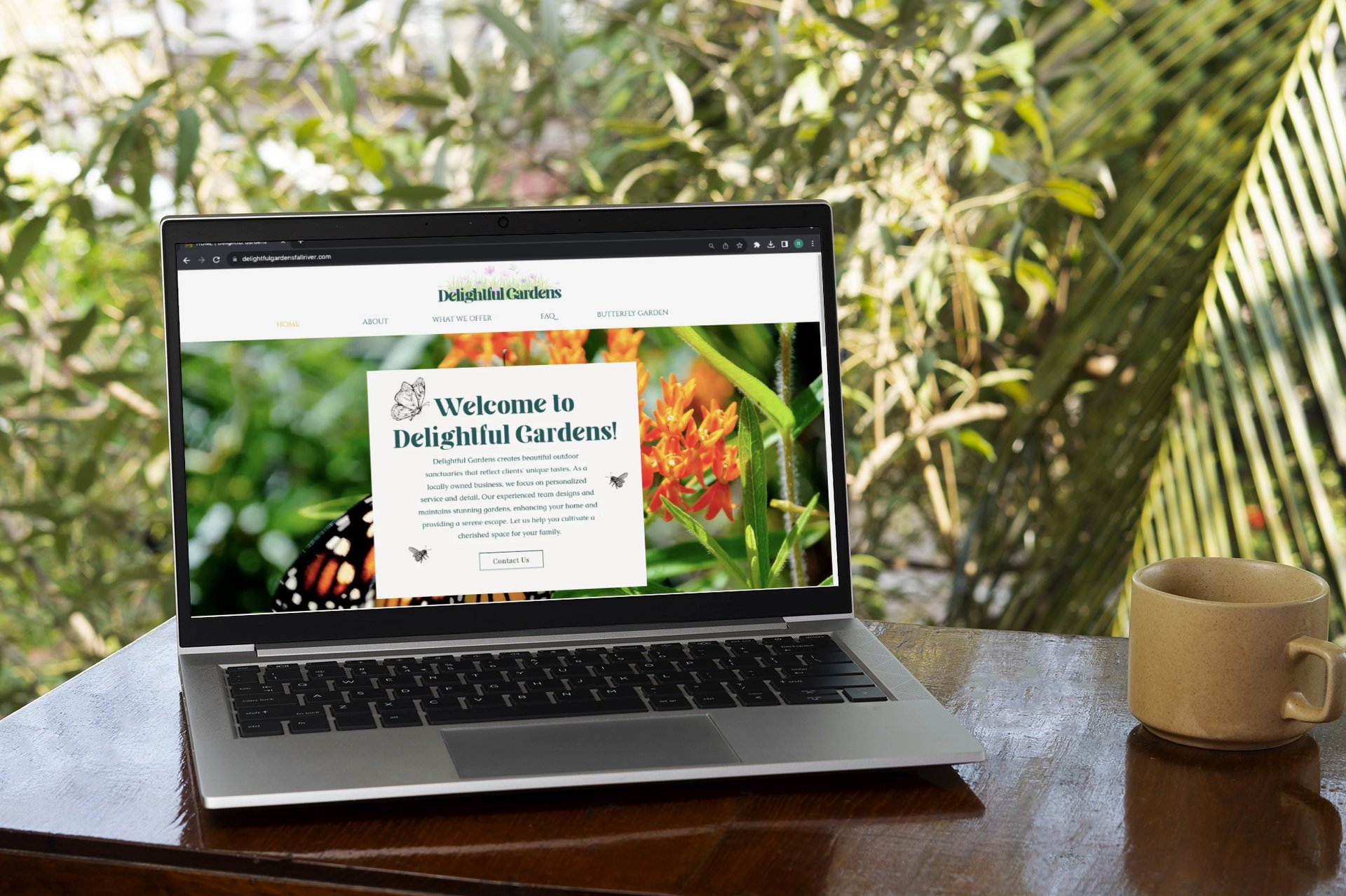 silver macbook on white table