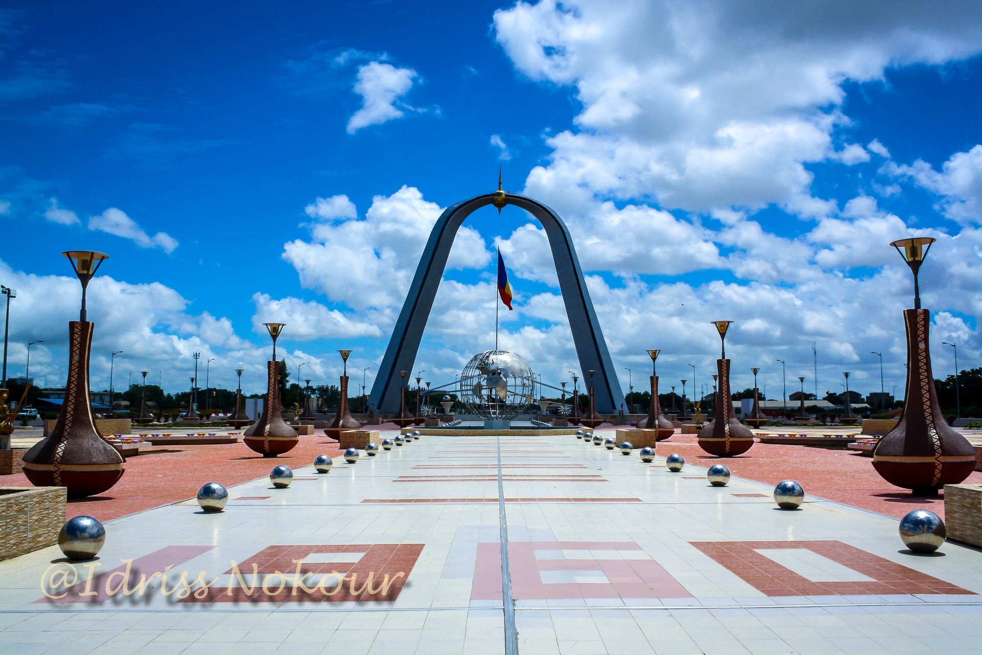 black and brown leather padded tub sofa