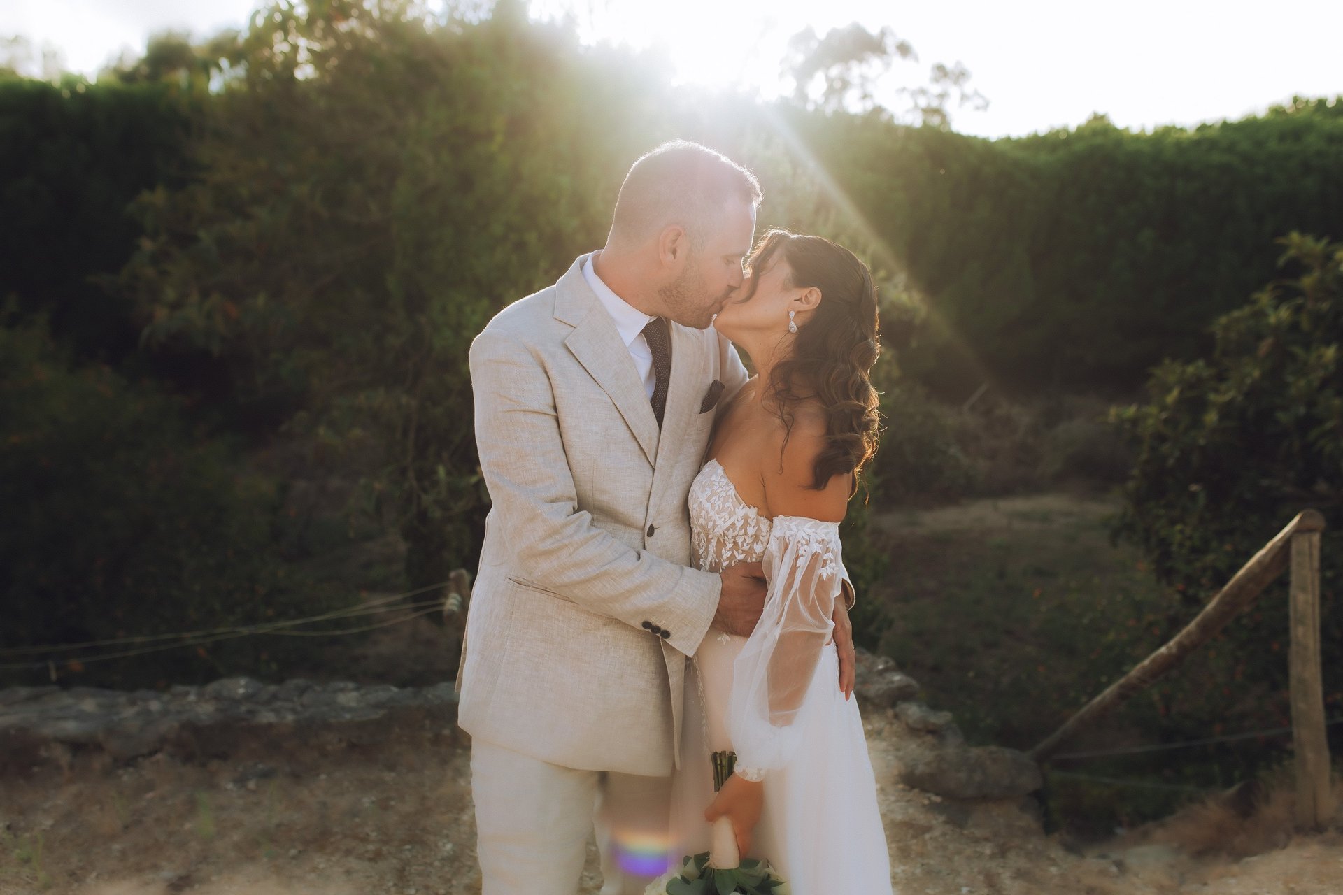an abstract photo of a curved building with a blue sky in the background