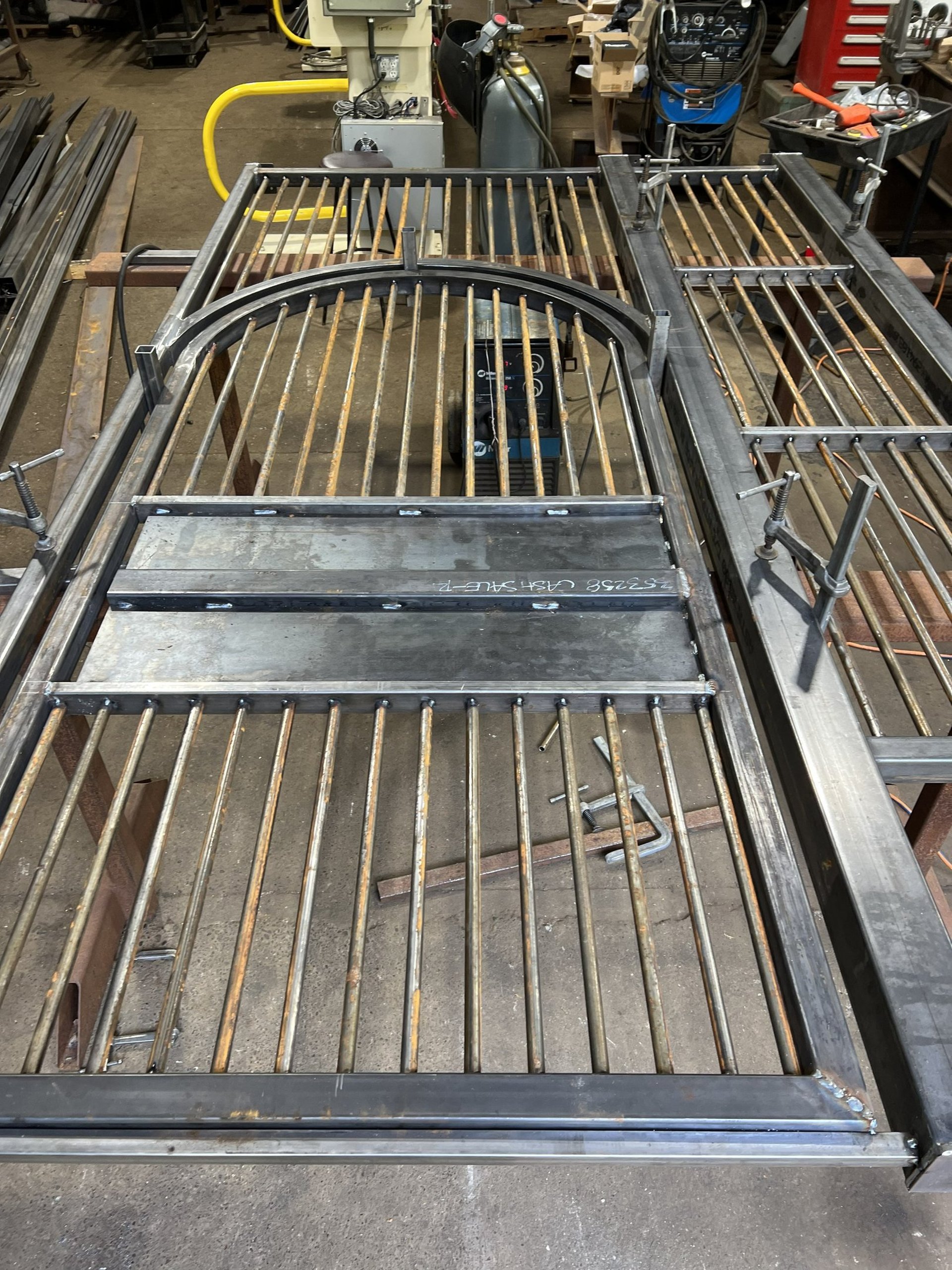 black and brown leather padded tub sofa