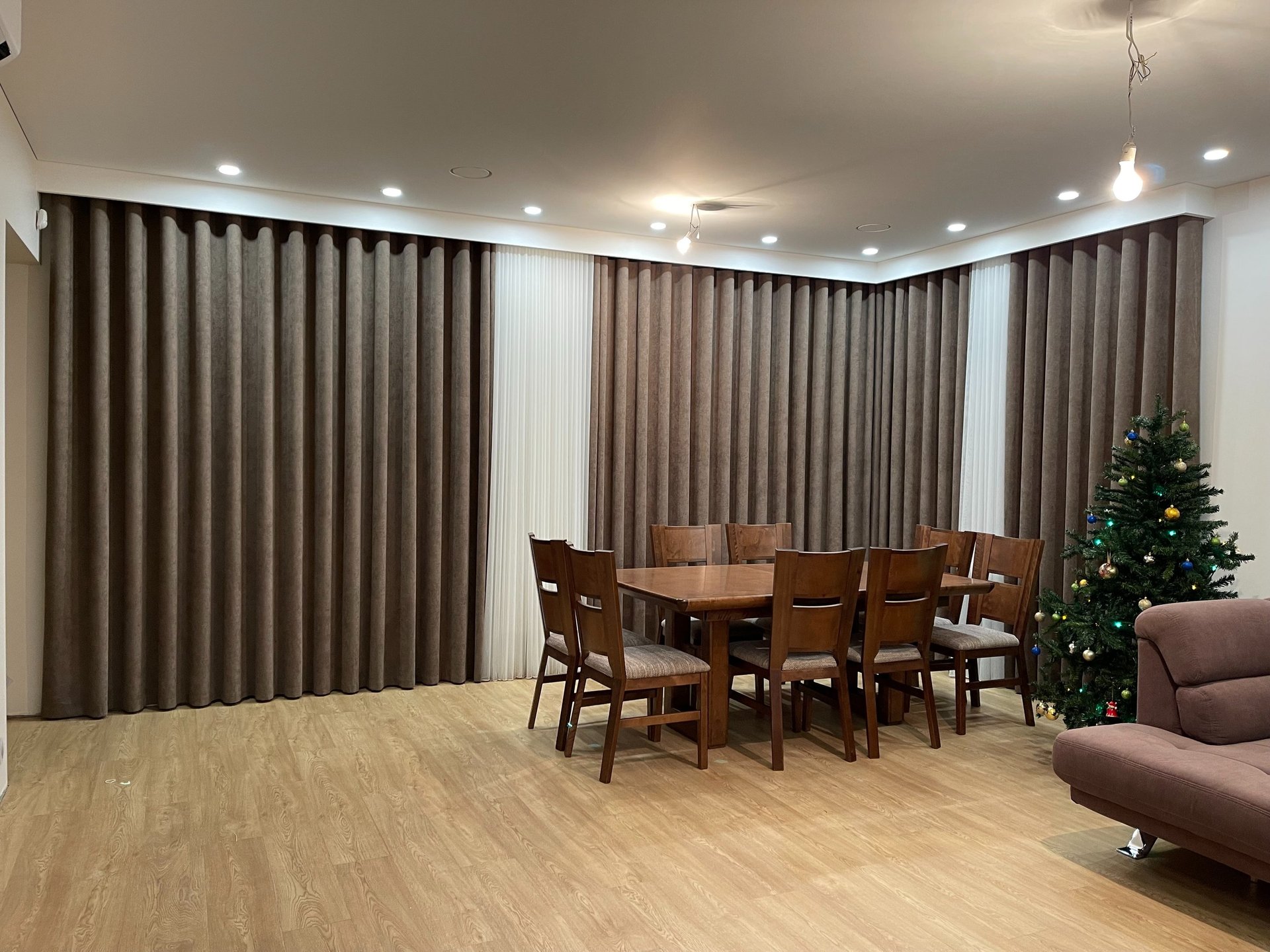 woman wearing yellow long-sleeved dress under white clouds and blue sky during daytime