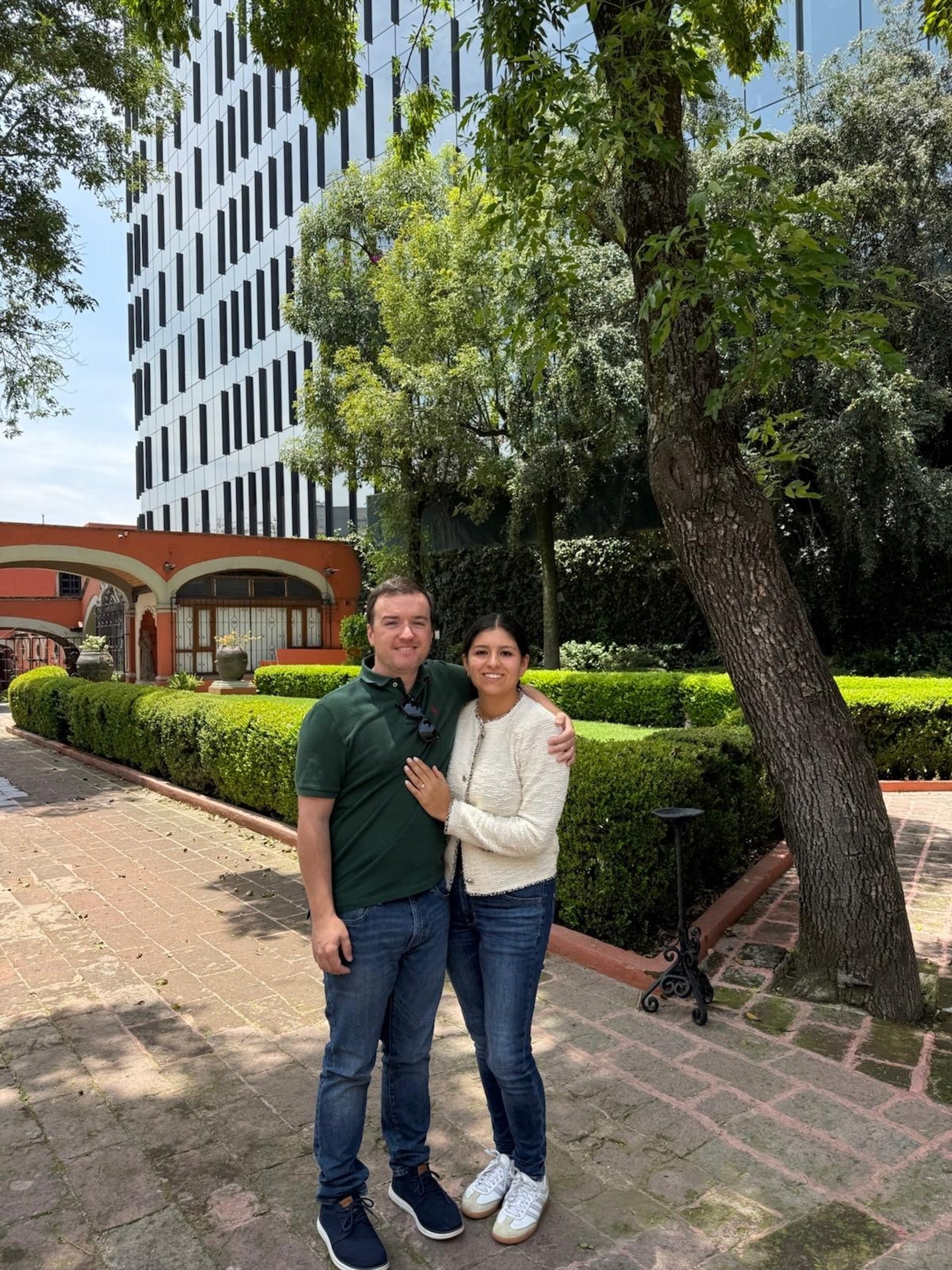couple wearing silver-colored rings