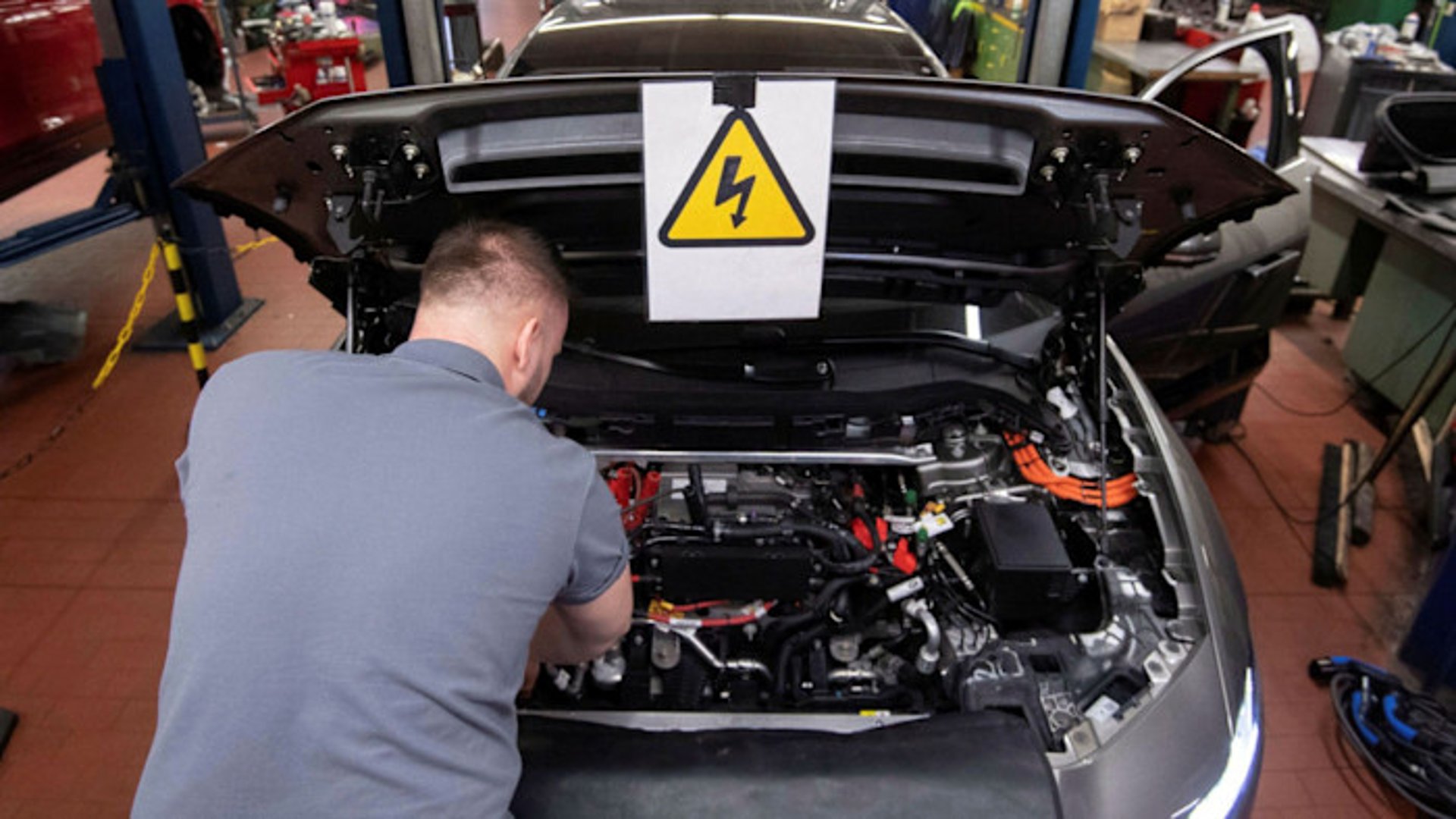 black and brown leather padded tub sofa