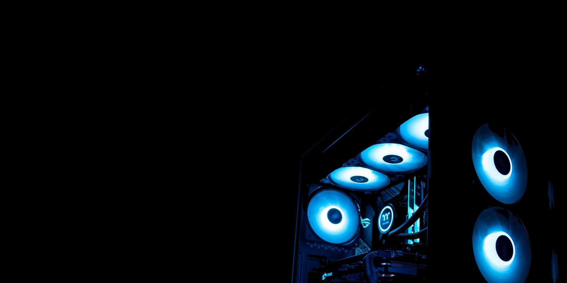 an abstract photo of a curved building with a blue sky in the background