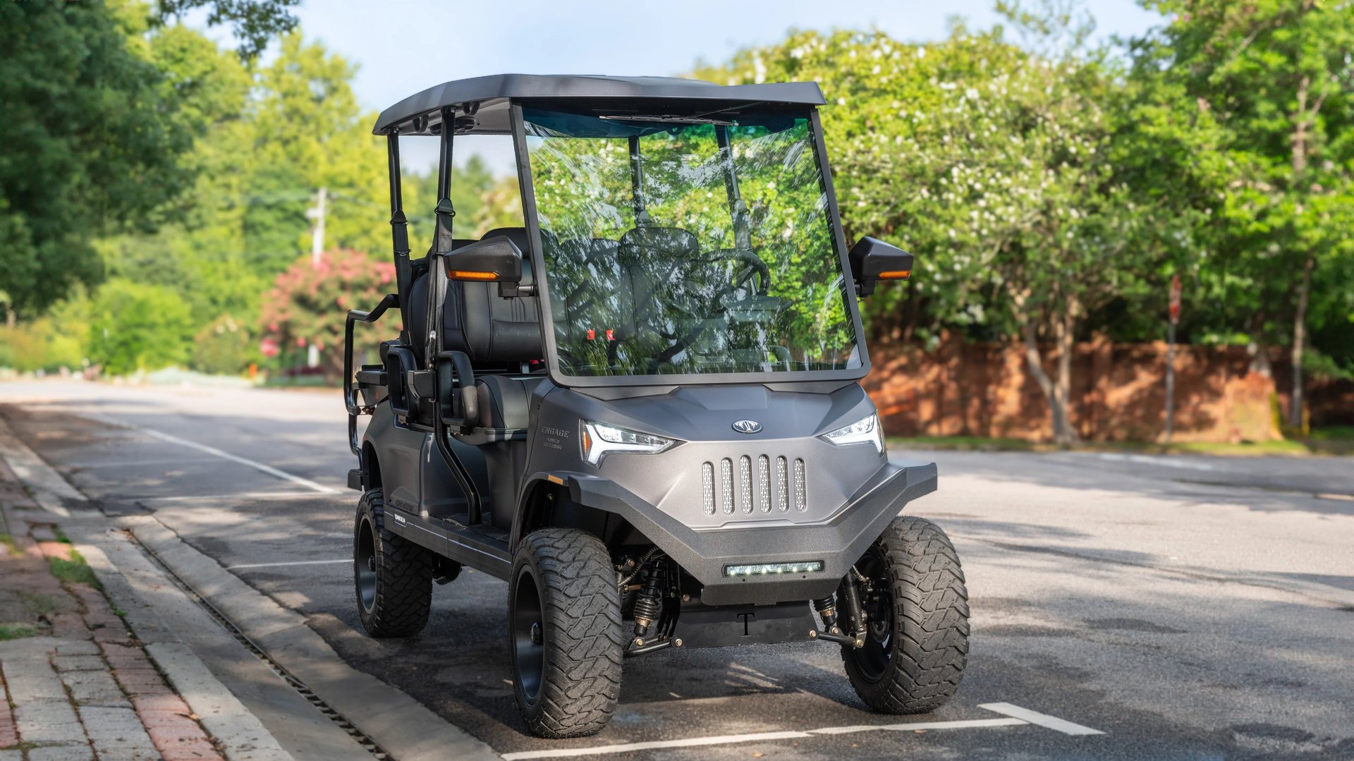 black and brown leather padded tub sofa