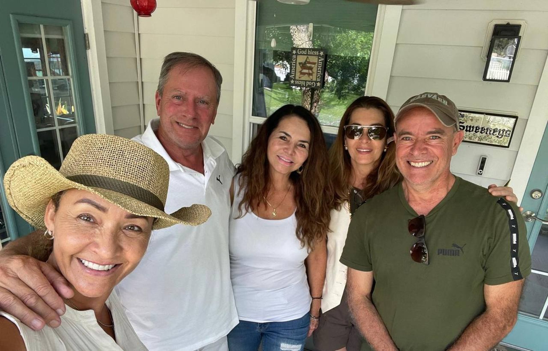 woman wearing yellow long-sleeved dress under white clouds and blue sky during daytime