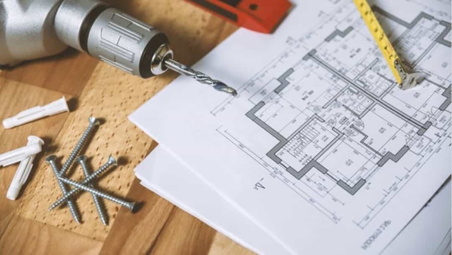 an abstract photo of a curved building with a blue sky in the background