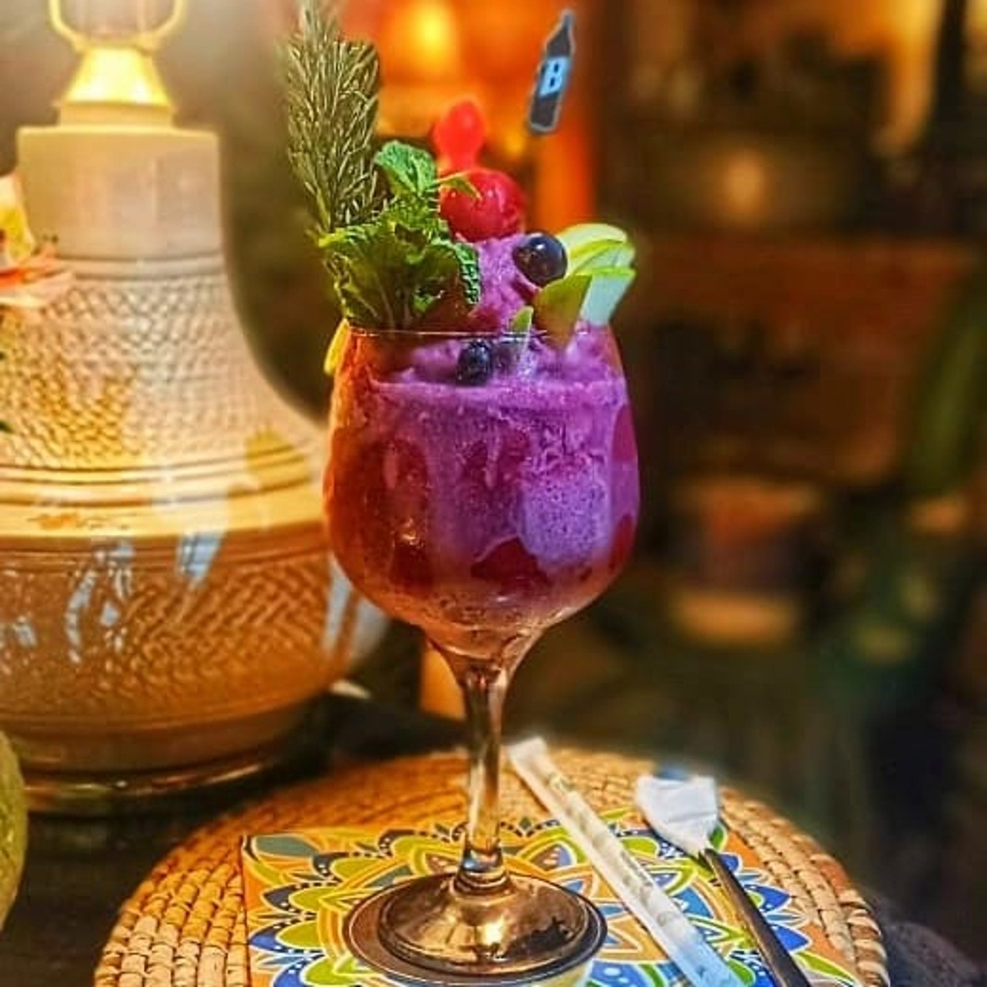 woman wearing yellow long-sleeved dress under white clouds and blue sky during daytime