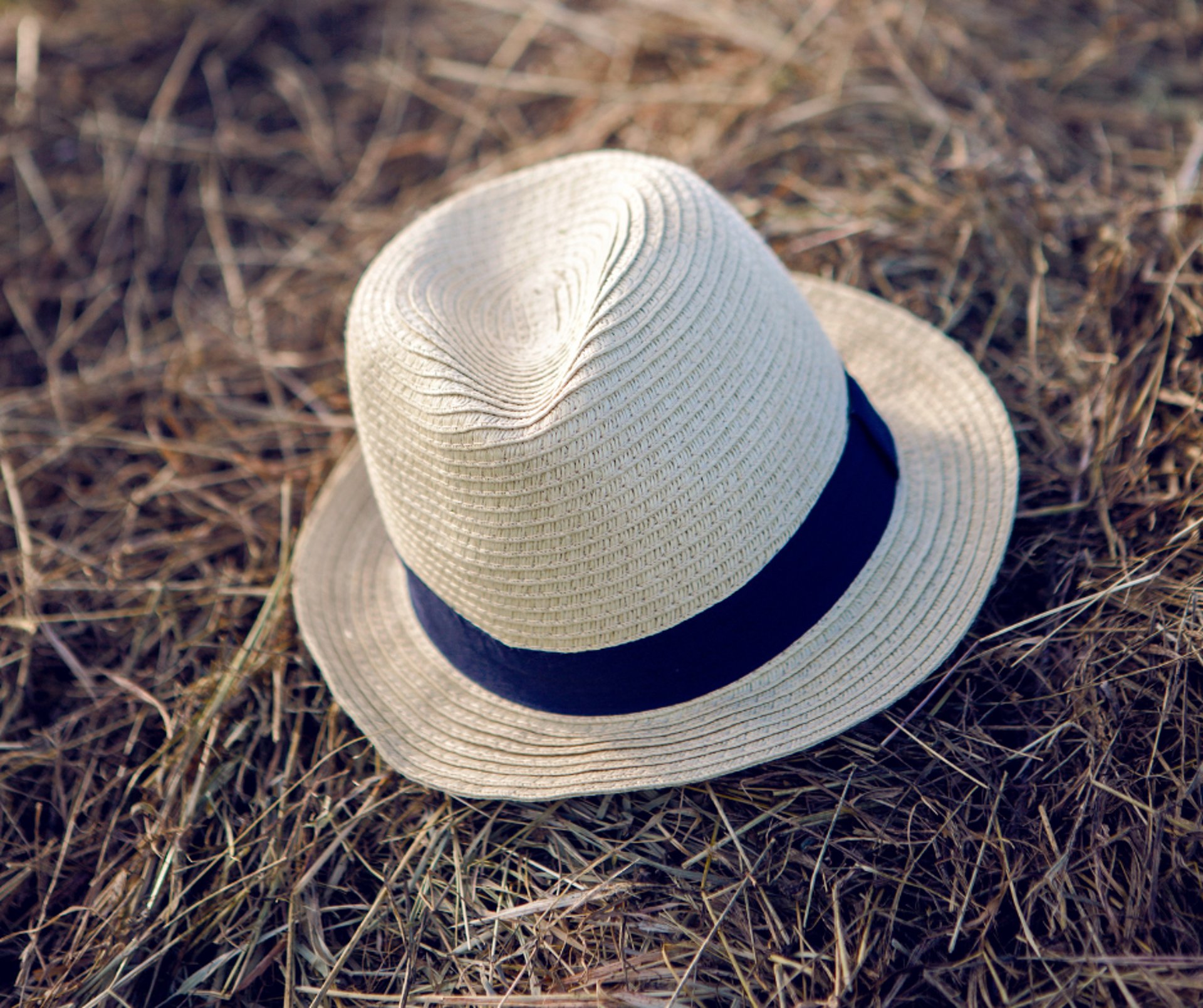 white cowboy hat on black background