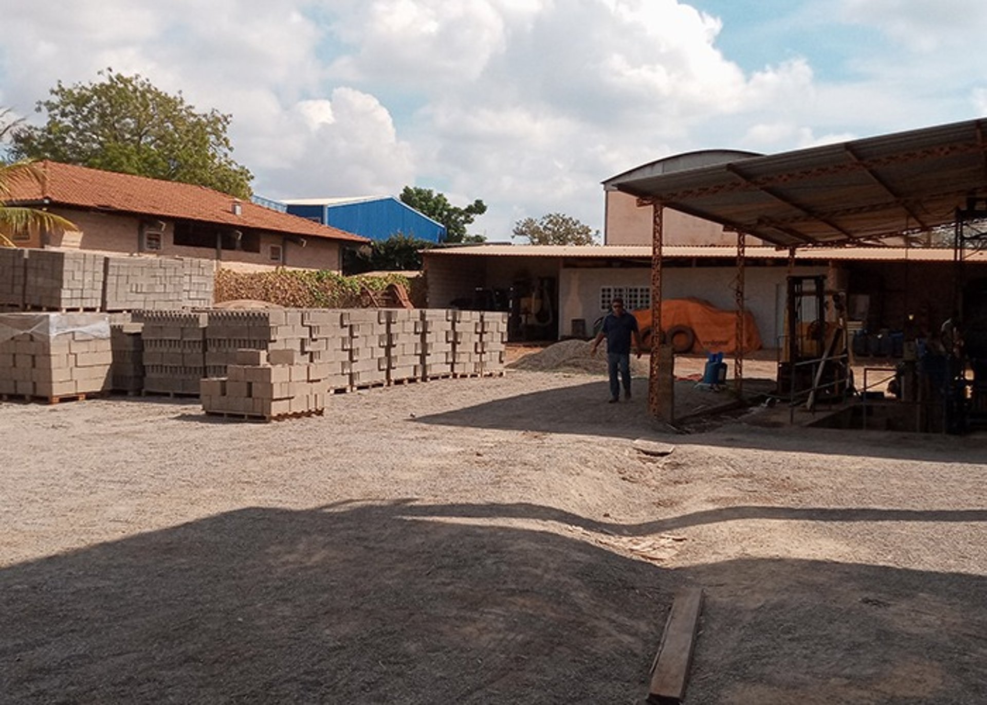 an abstract photo of a curved building with a blue sky in the background