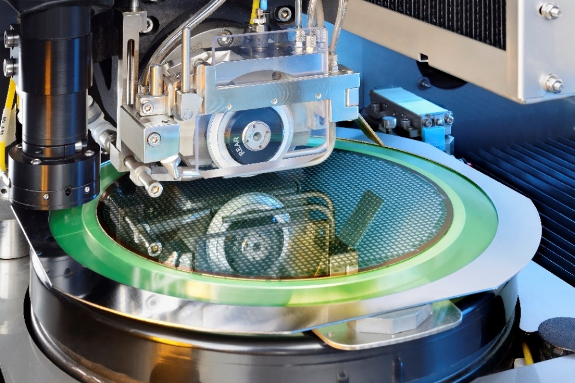 an abstract photo of a curved building with a blue sky in the background