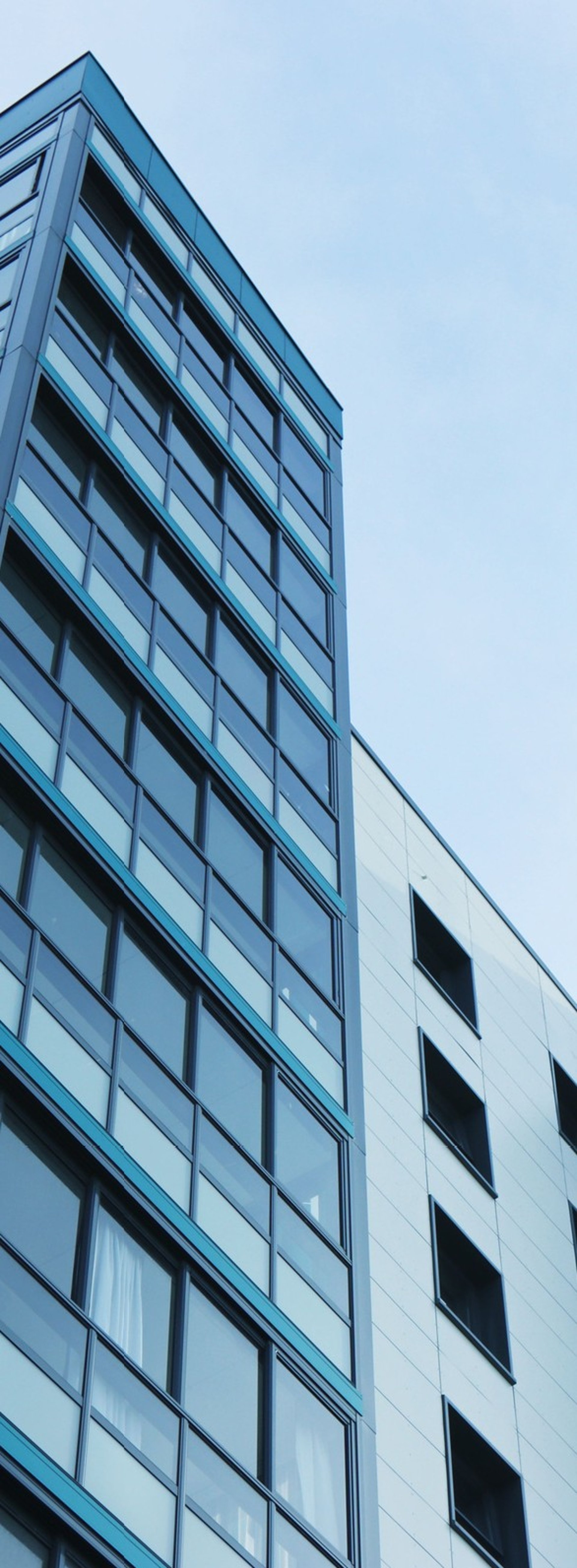 black and brown leather padded tub sofa