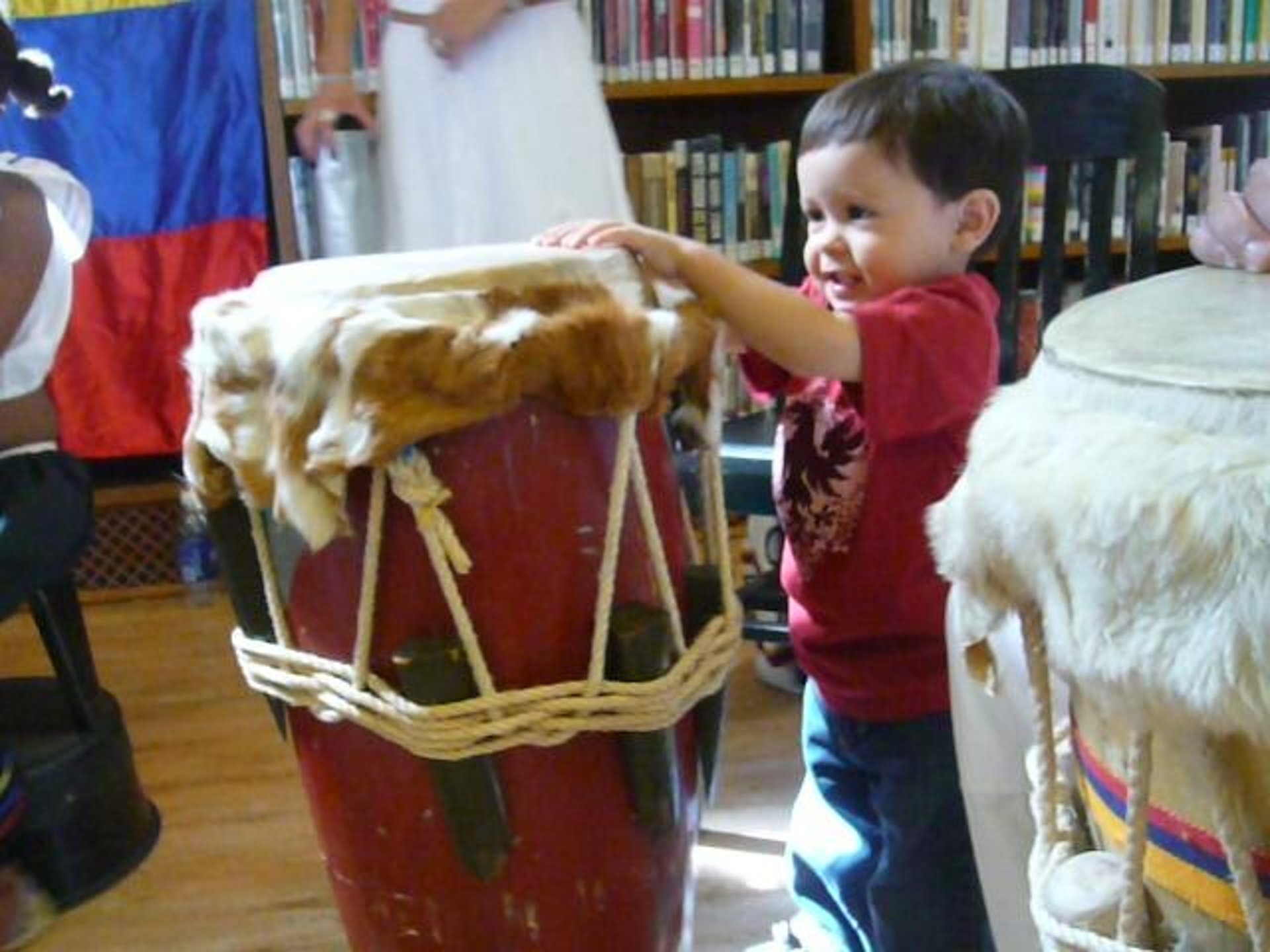 an abstract photo of a curved building with a blue sky in the background