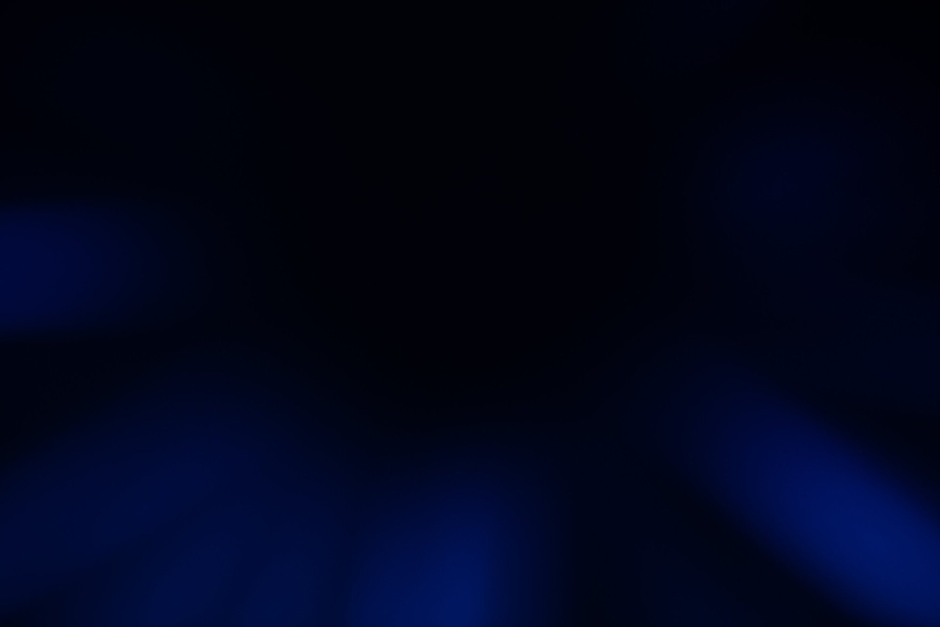 a pile of keys sitting on top of a table