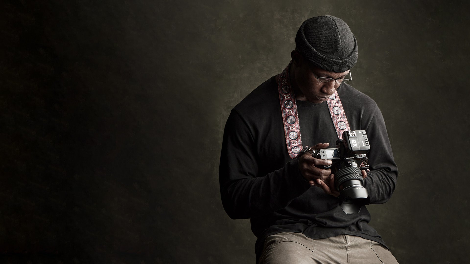 an abstract photo of a curved building with a blue sky in the background