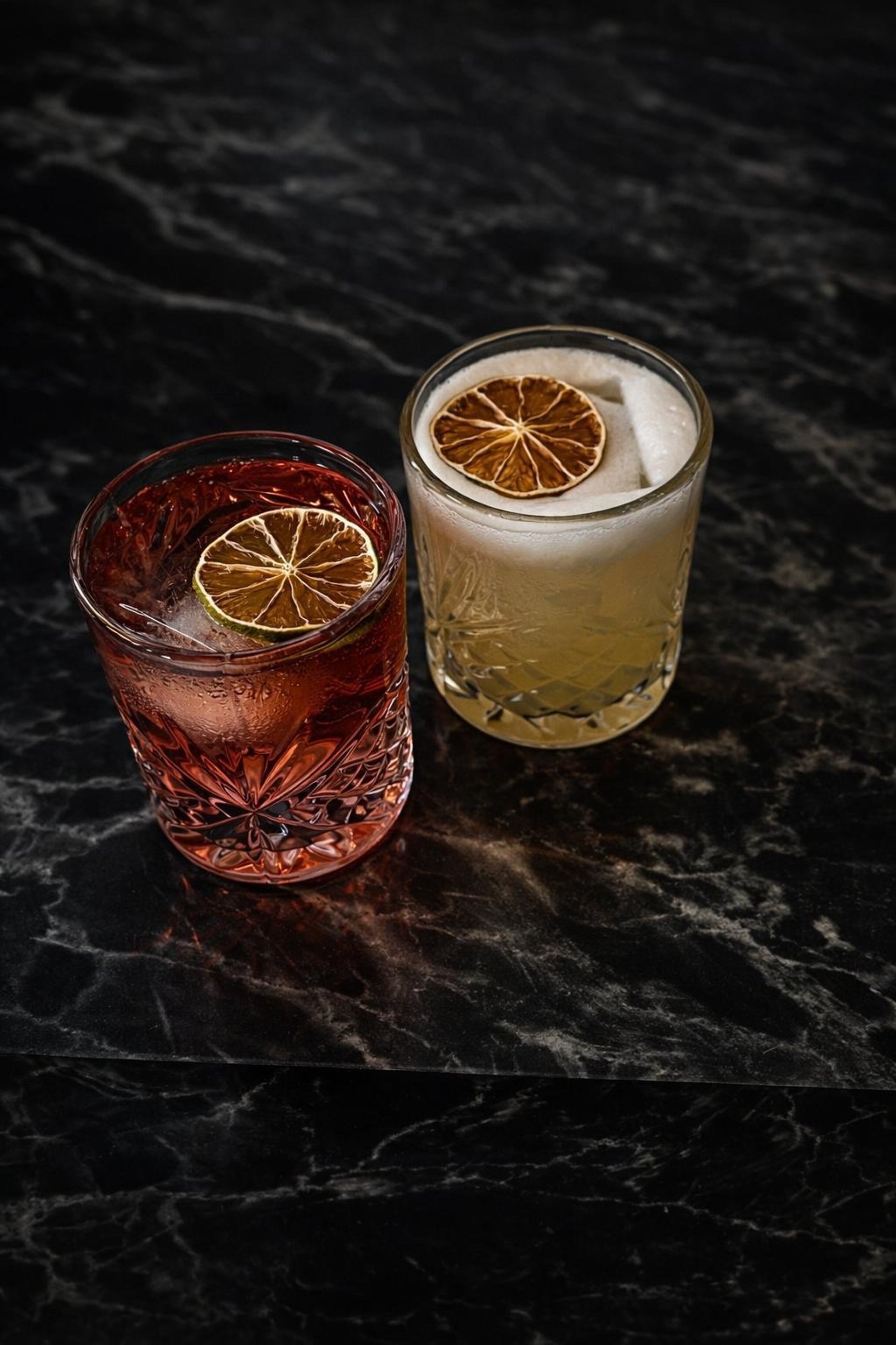 Creamy cocktail with flowers and cinnamon stick garnish