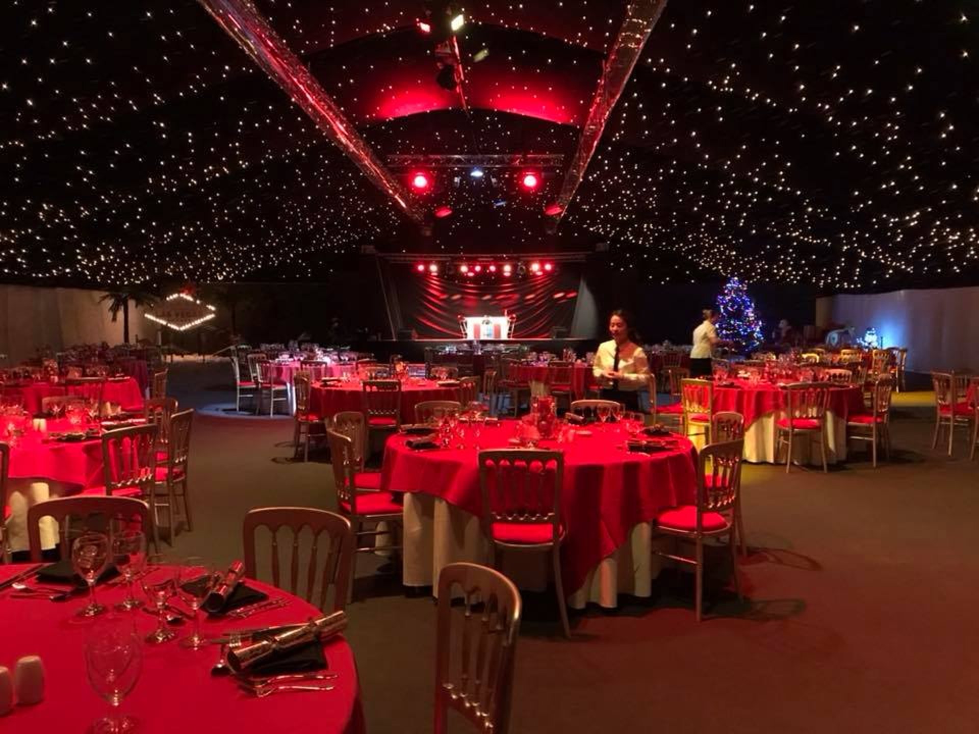 woman wearing yellow long-sleeved dress under white clouds and blue sky during daytime