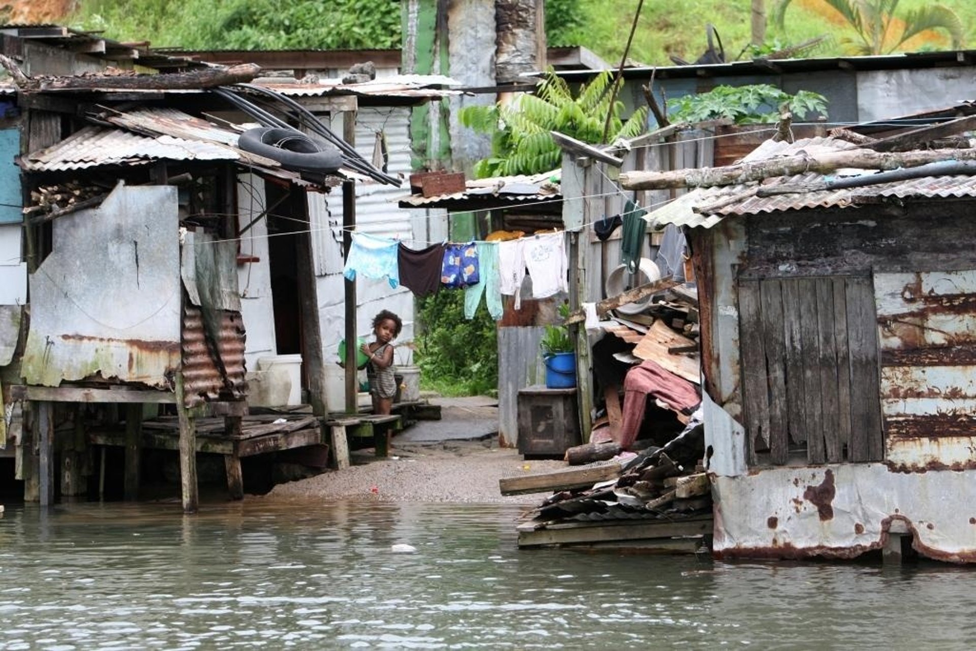 a close up of a black and brown abstract painting