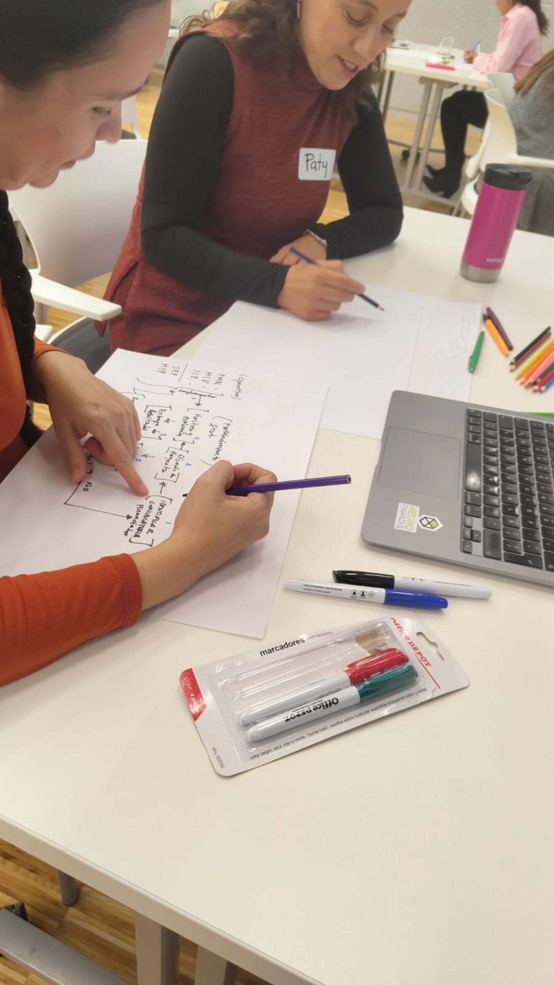an abstract photo of a curved building with a blue sky in the background