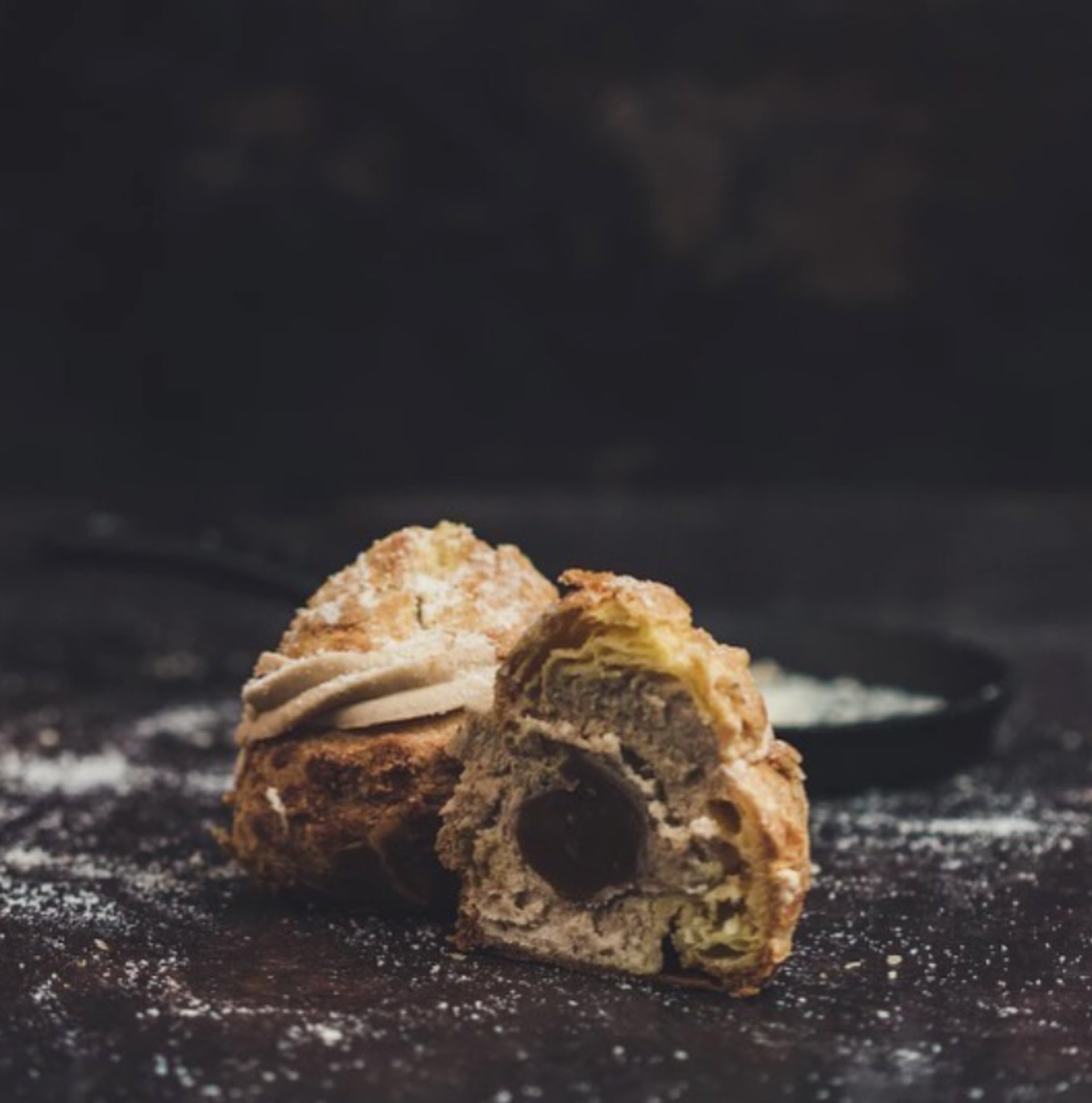 an abstract photo of a curved building with a blue sky in the background