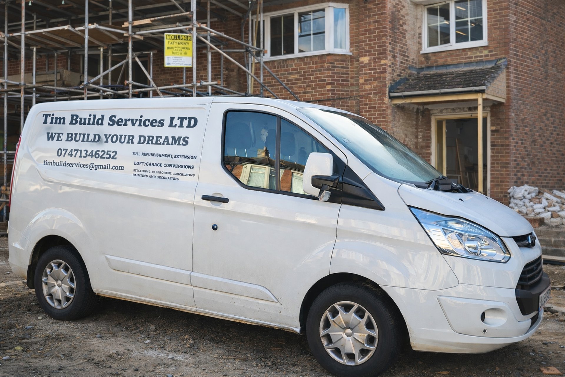 brown-and-black wooden 5-piece dining set