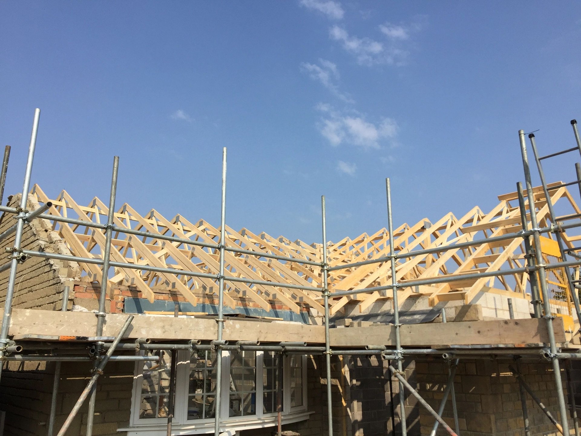 black and brown leather padded tub sofa