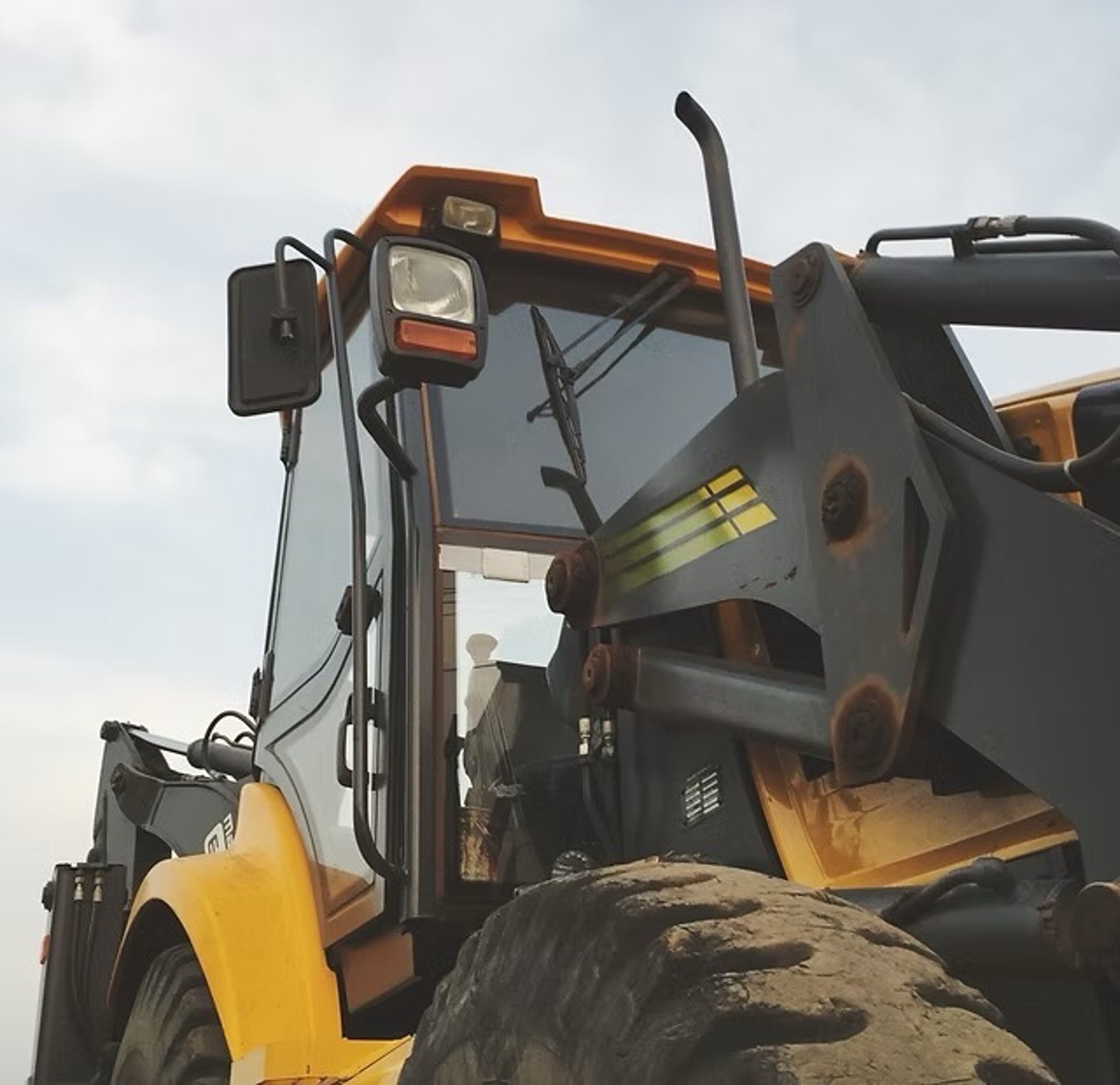 black and brown leather padded tub sofa