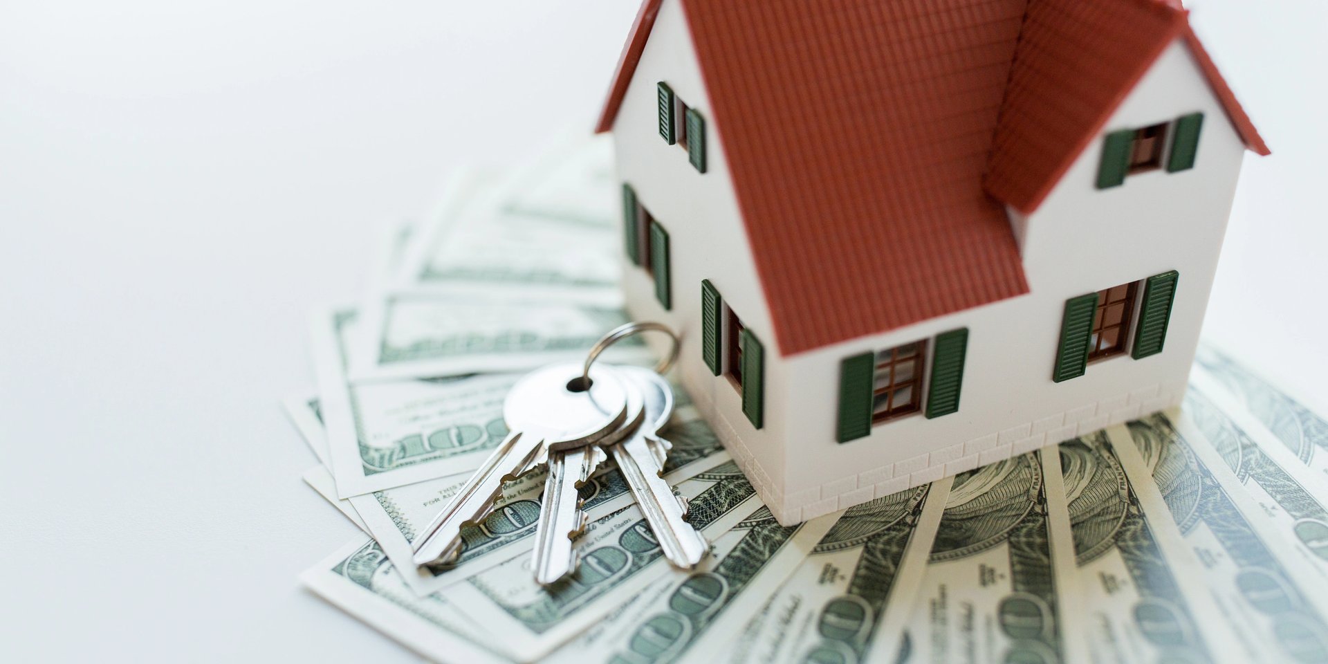 an abstract photo of a curved building with a blue sky in the background