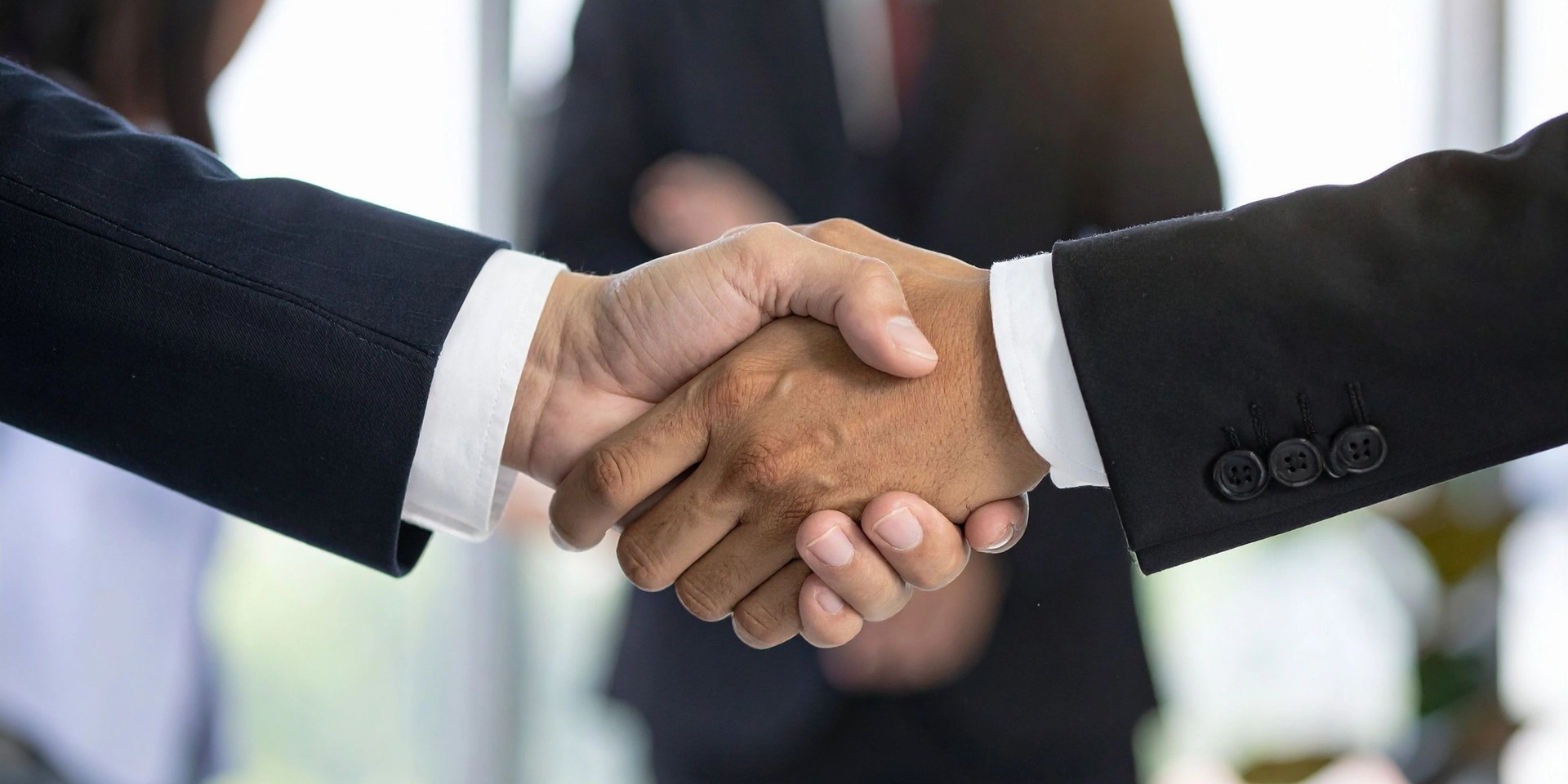 an abstract photo of a curved building with a blue sky in the background