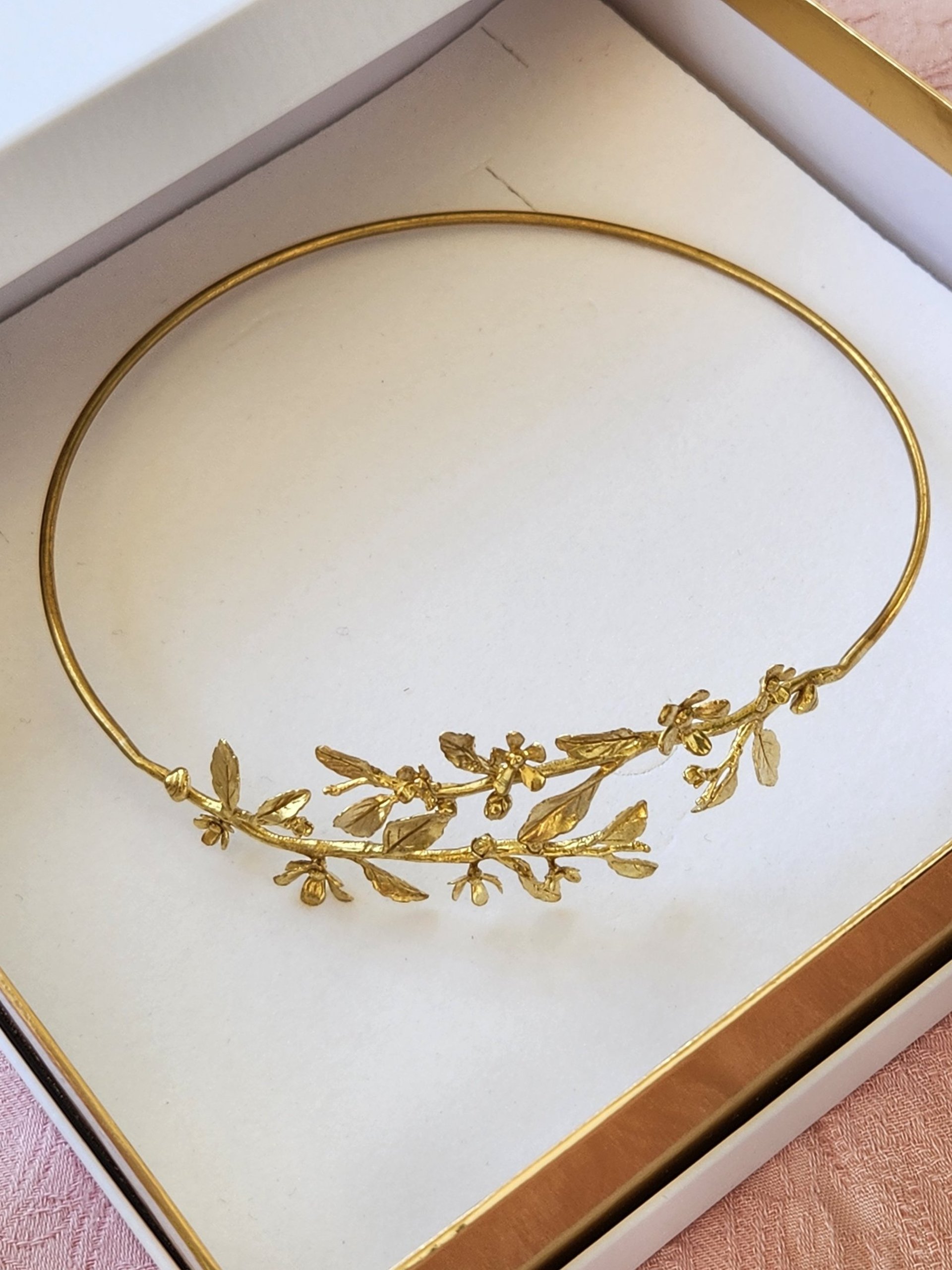a golden object sitting on top of a table