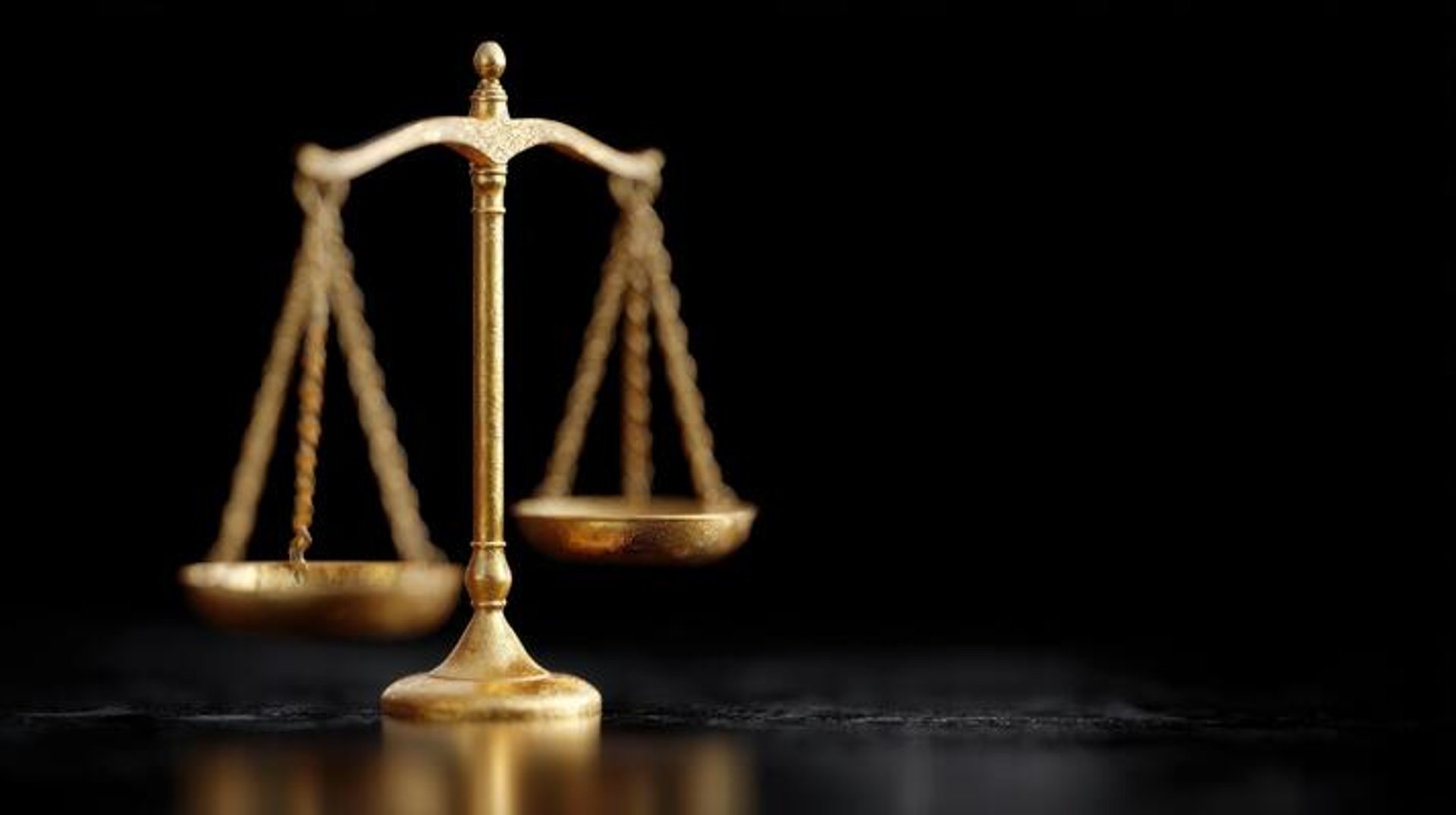 a judge's gaven on a wooden table