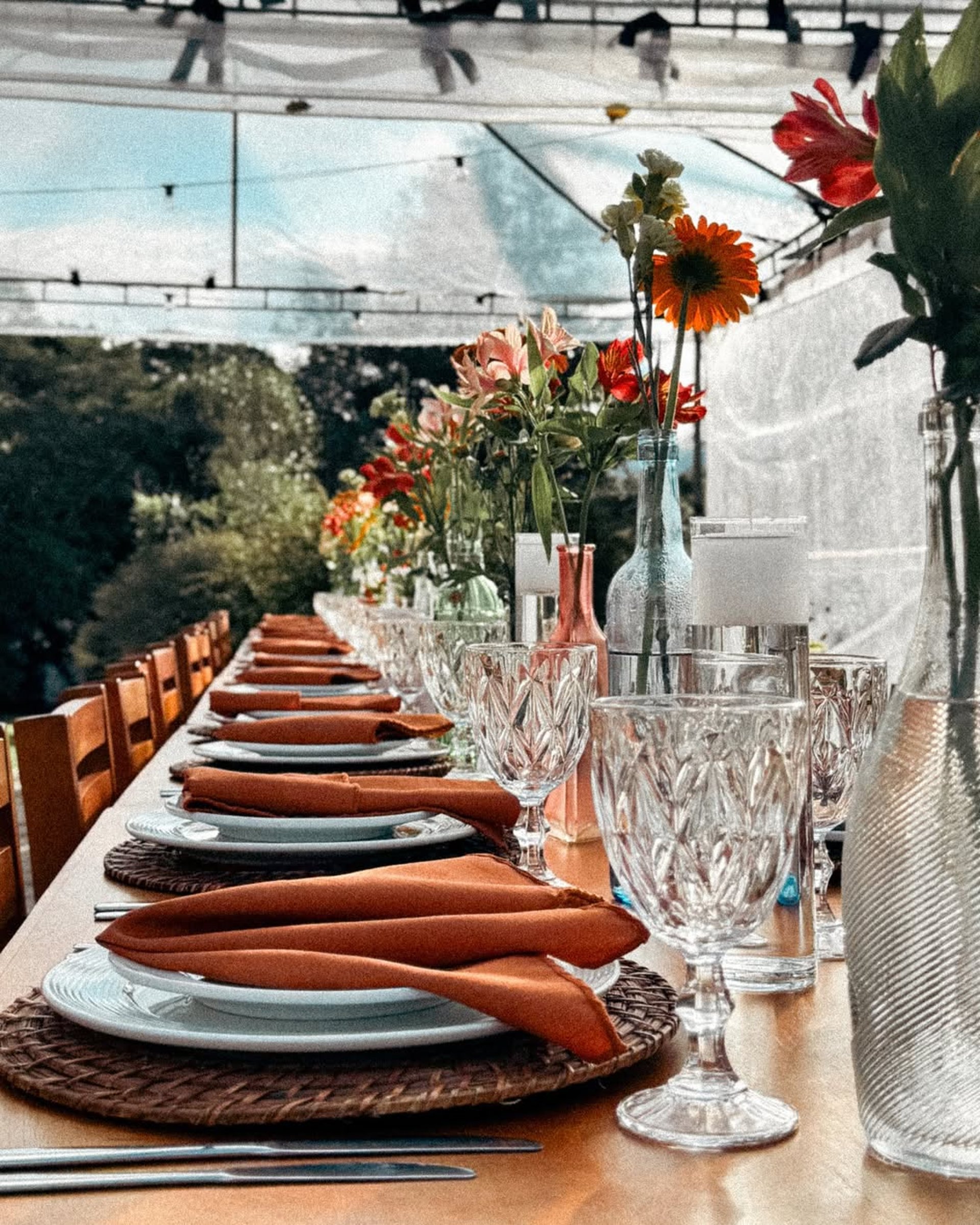 an abstract photo of a curved building with a blue sky in the background
