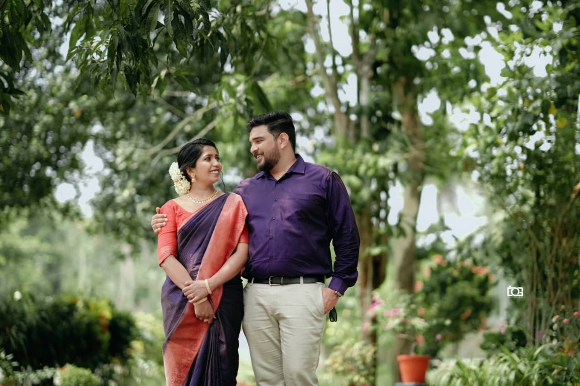 couple wearing silver-colored rings