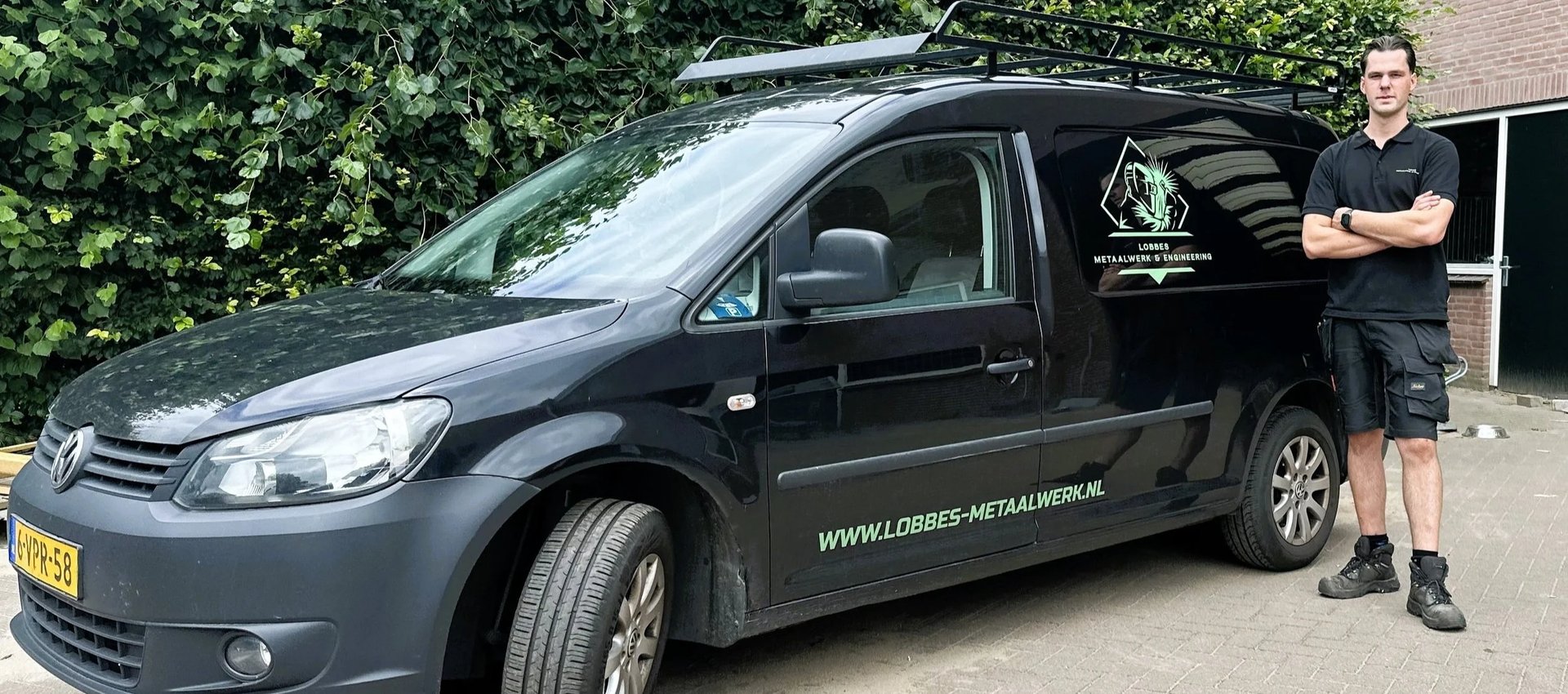 black and brown leather padded tub sofa