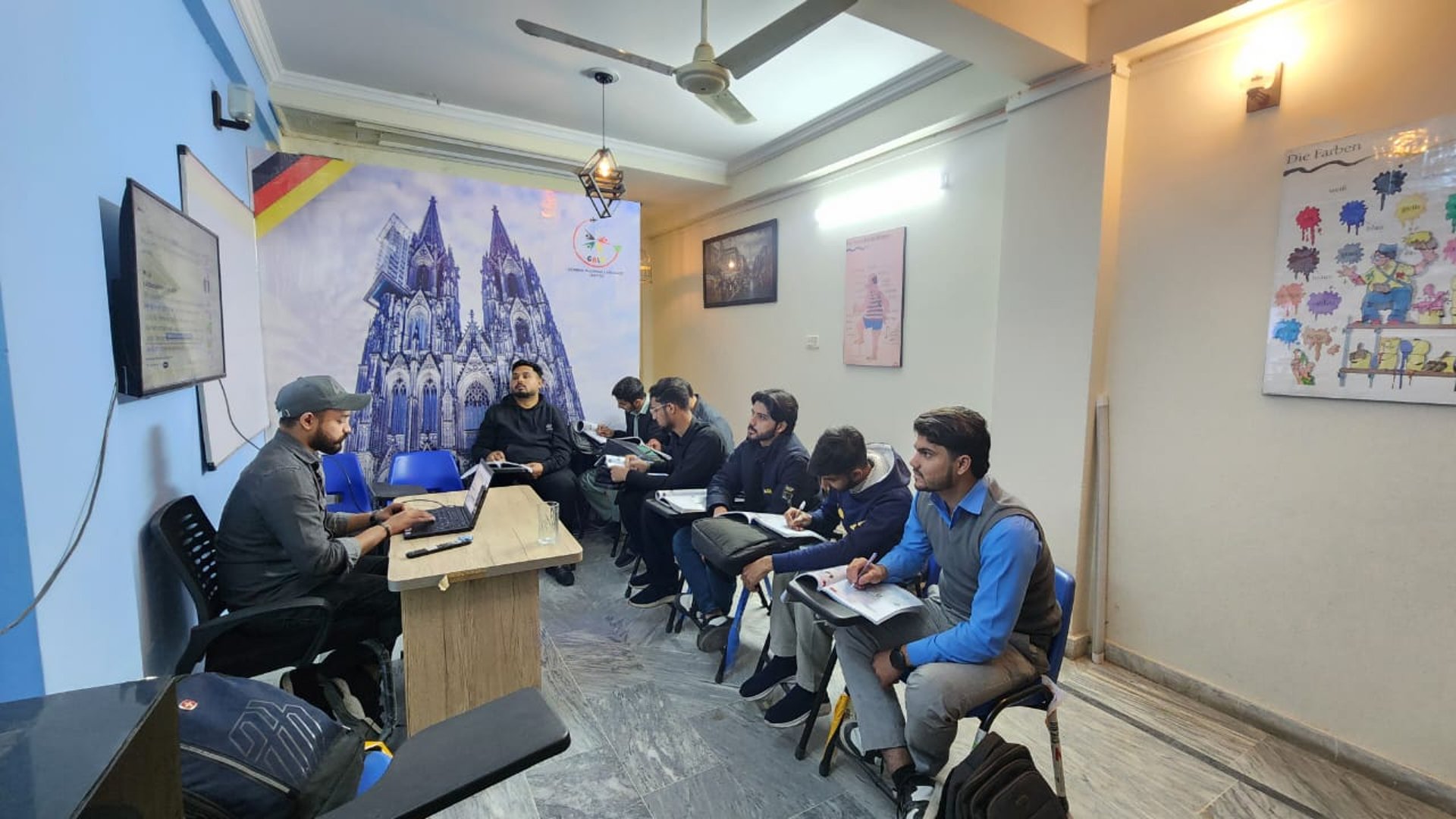 an abstract photo of a curved building with a blue sky in the background