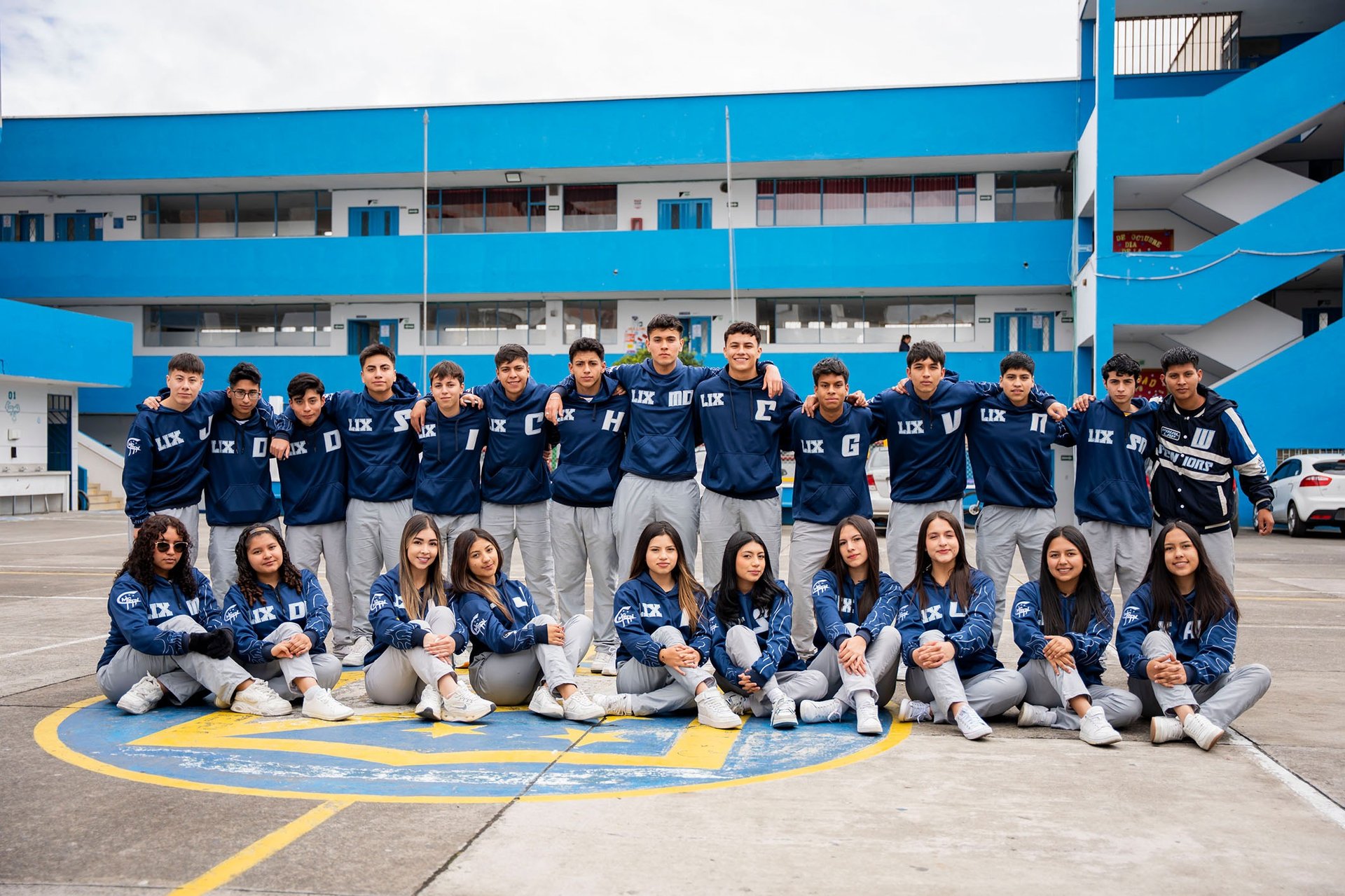 woman wearing yellow long-sleeved dress under white clouds and blue sky during daytime
